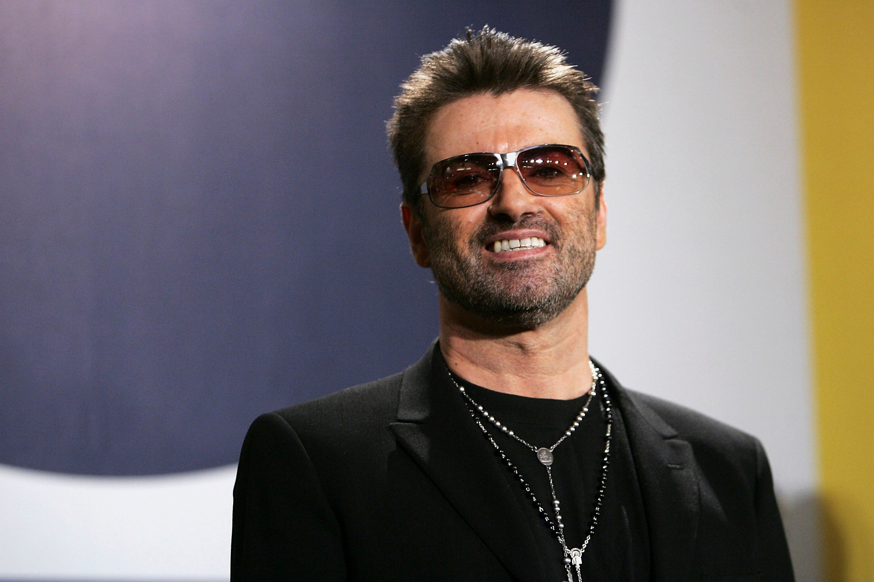 Singer George Michael poses at the 'George Michael: A Different Story' Photocall during the 55th annual Berlinale International Film Festival