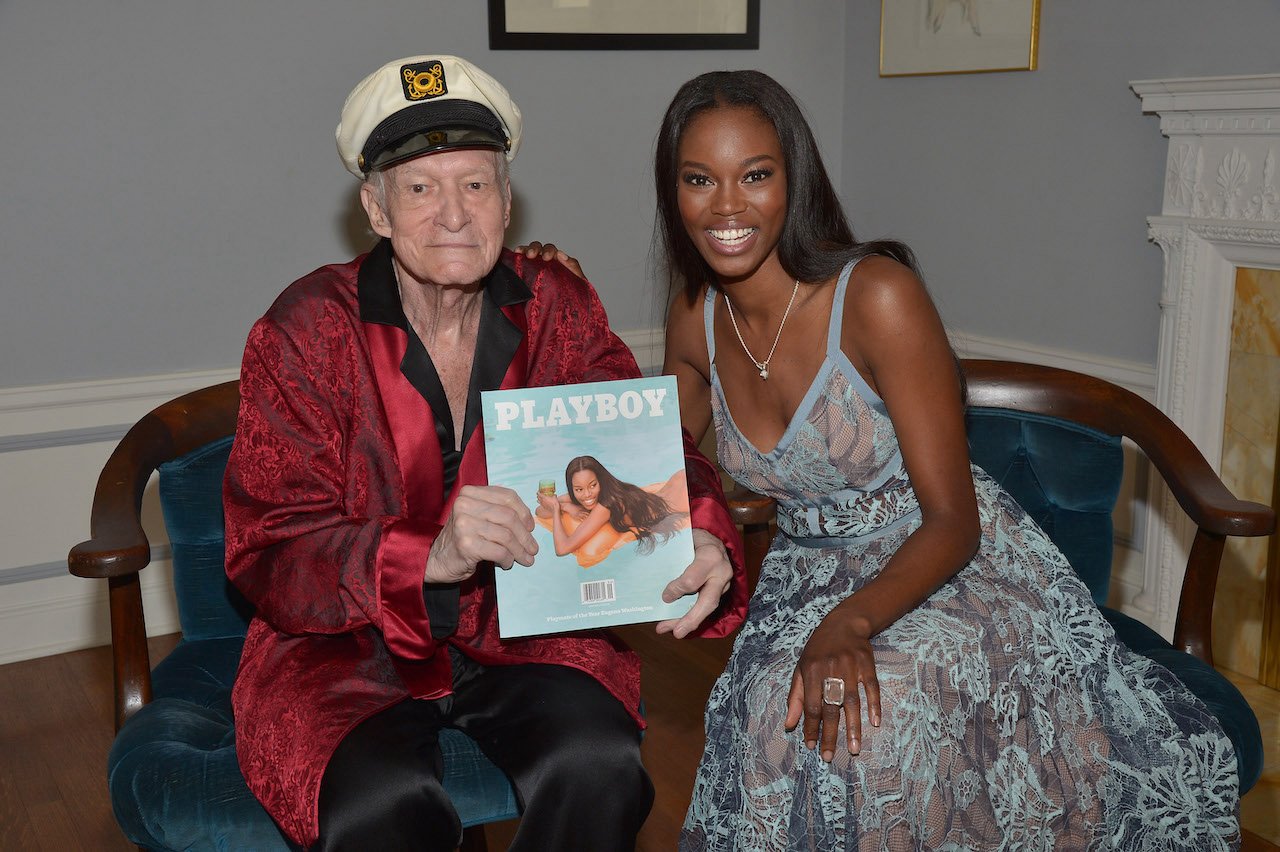 Hugh Hefner and 'America's Next Top Model' contestant Eugena Washington; Washington made history as the third Black woman to be listed as Playboy Magazine's Playmate of the Year