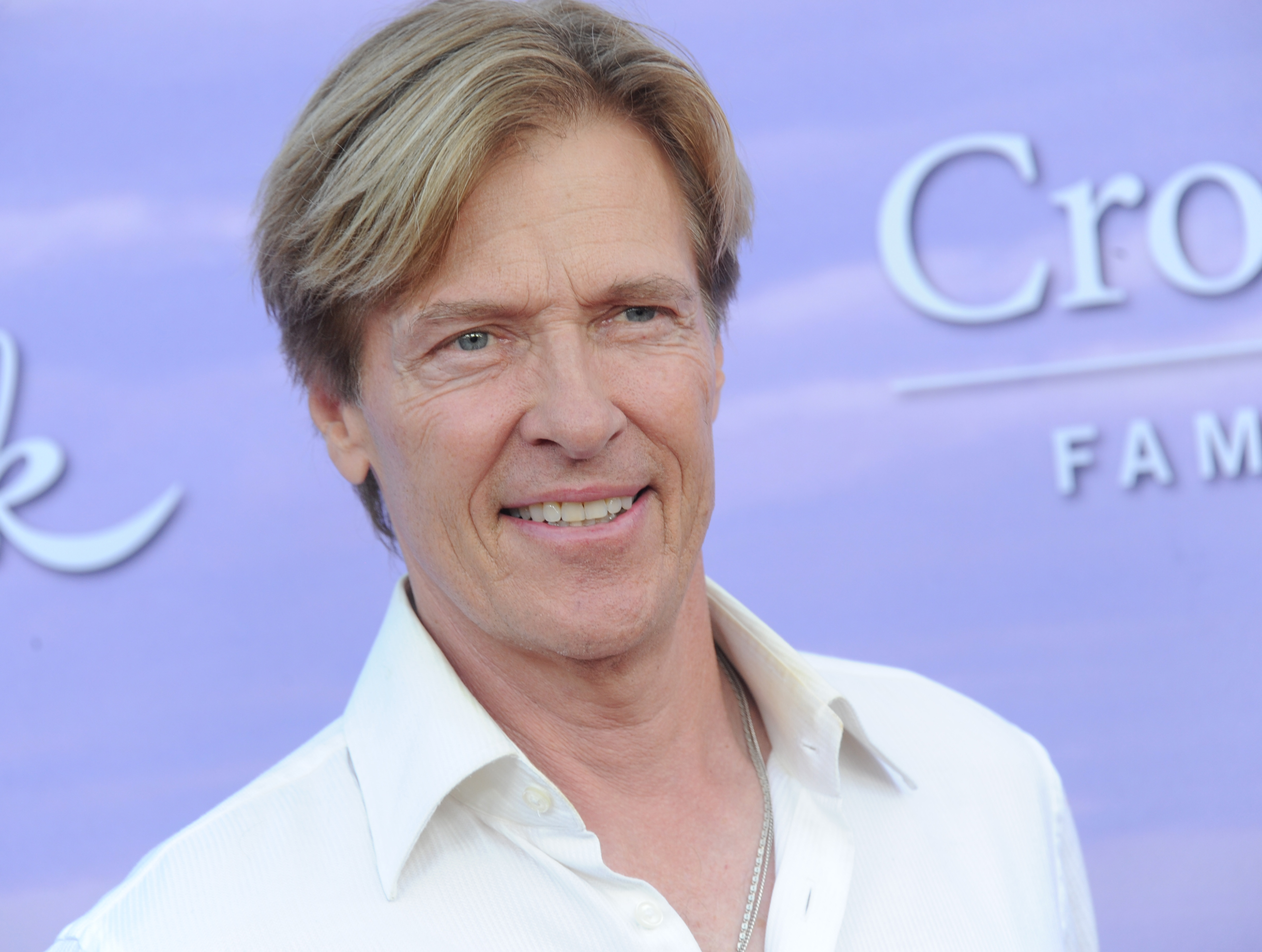 Jack Wagner of 'When Calls the Heart' wearing a white polo shirt