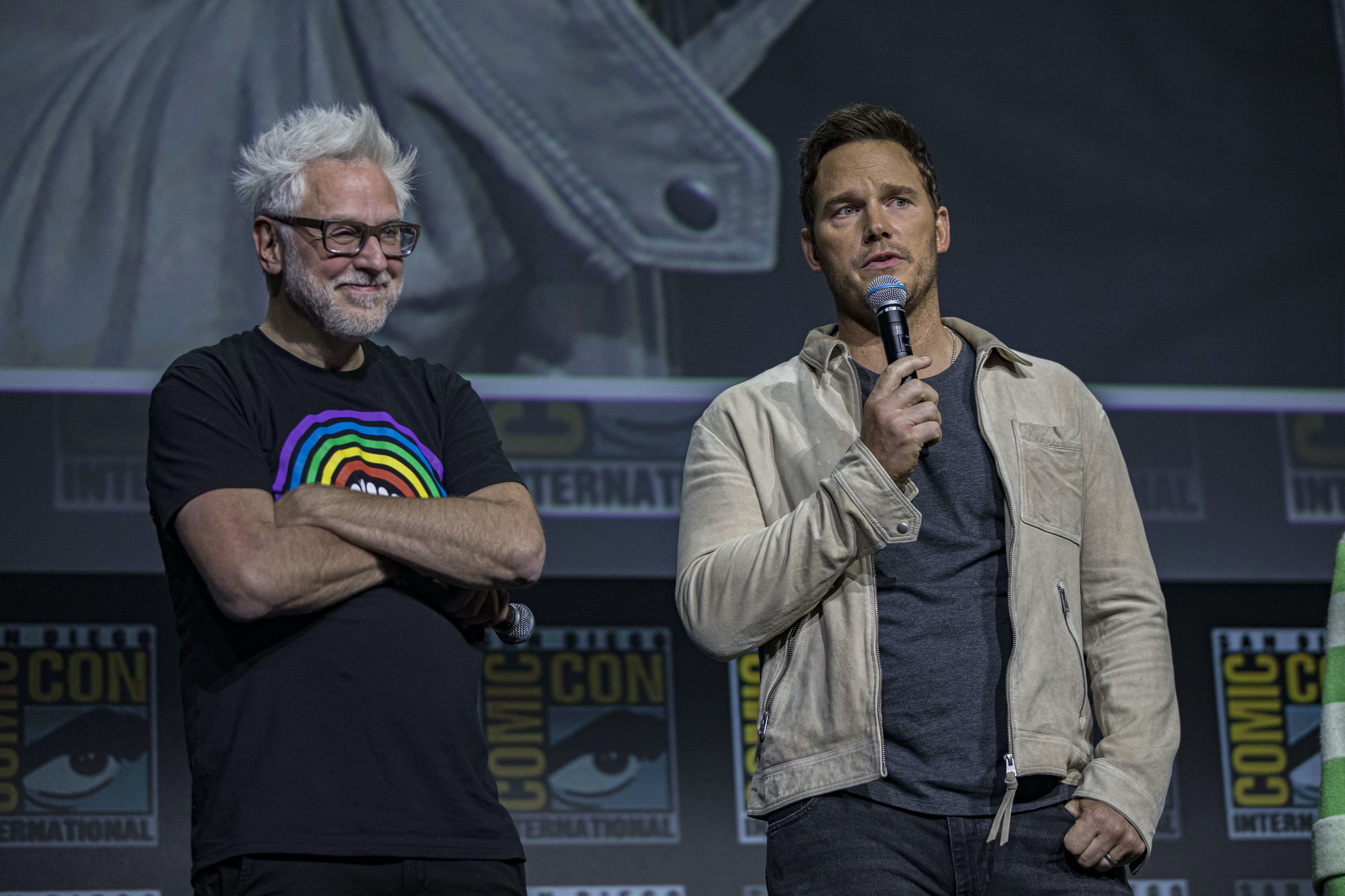James Gunn and Chris Pratt speak onstage about Guardians of the Galaxy Vol. 3 at the Marvel Cinematic Universe panel during 2022 San Diego Comic Con