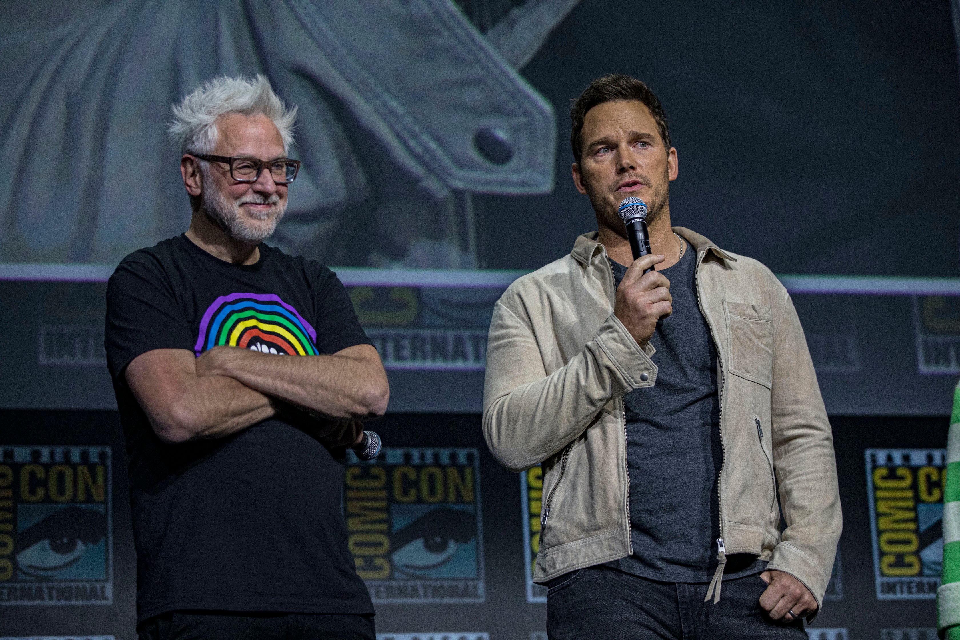 James Gunn and Chris Pratt speak onstage about Guardians of the Galaxy Vol. 3 at the Marvel Cinematic Universe panel during 2022 San Diego Comic Con