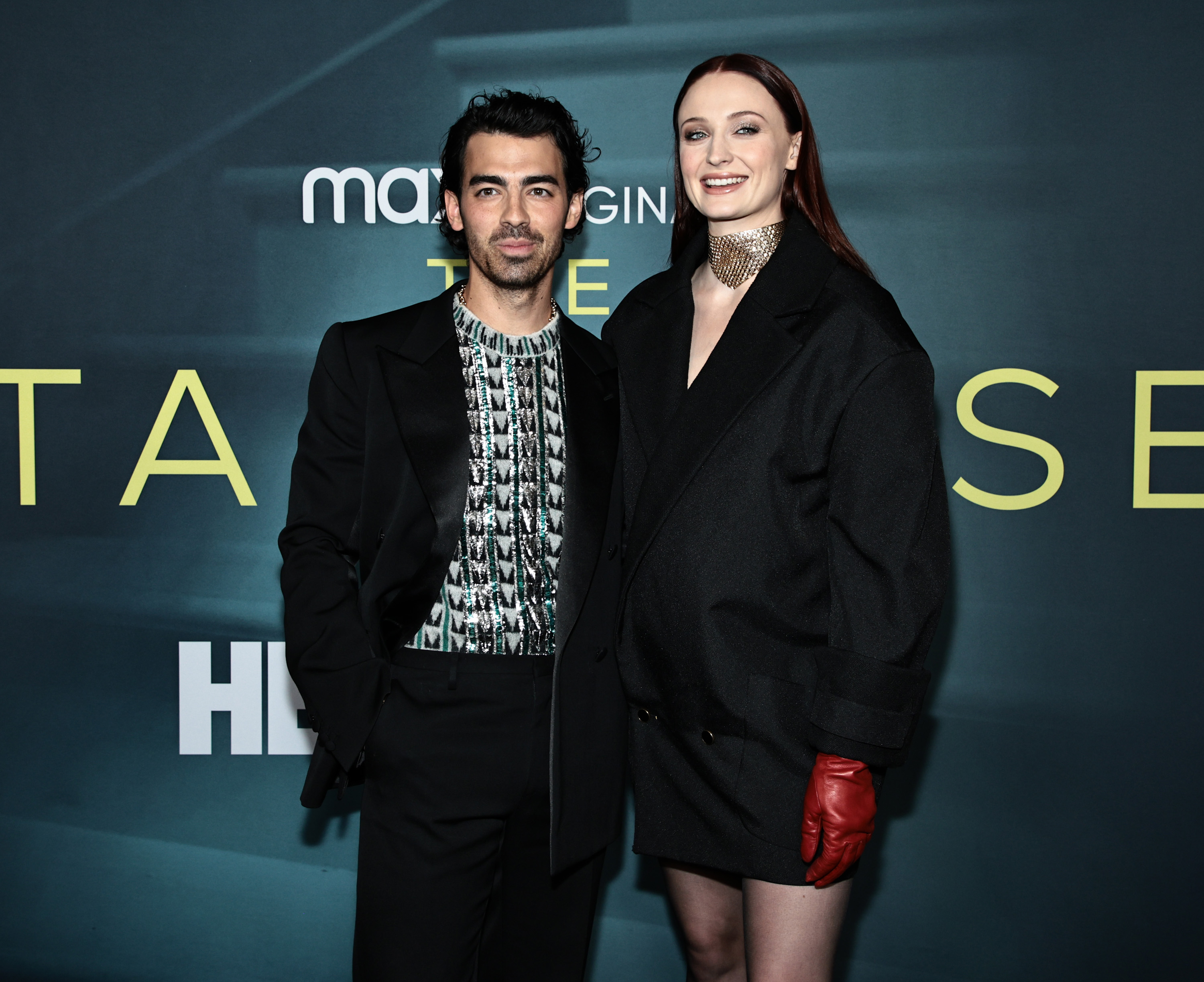 Joe Jonas and Sophie Turner pose together at a media event.