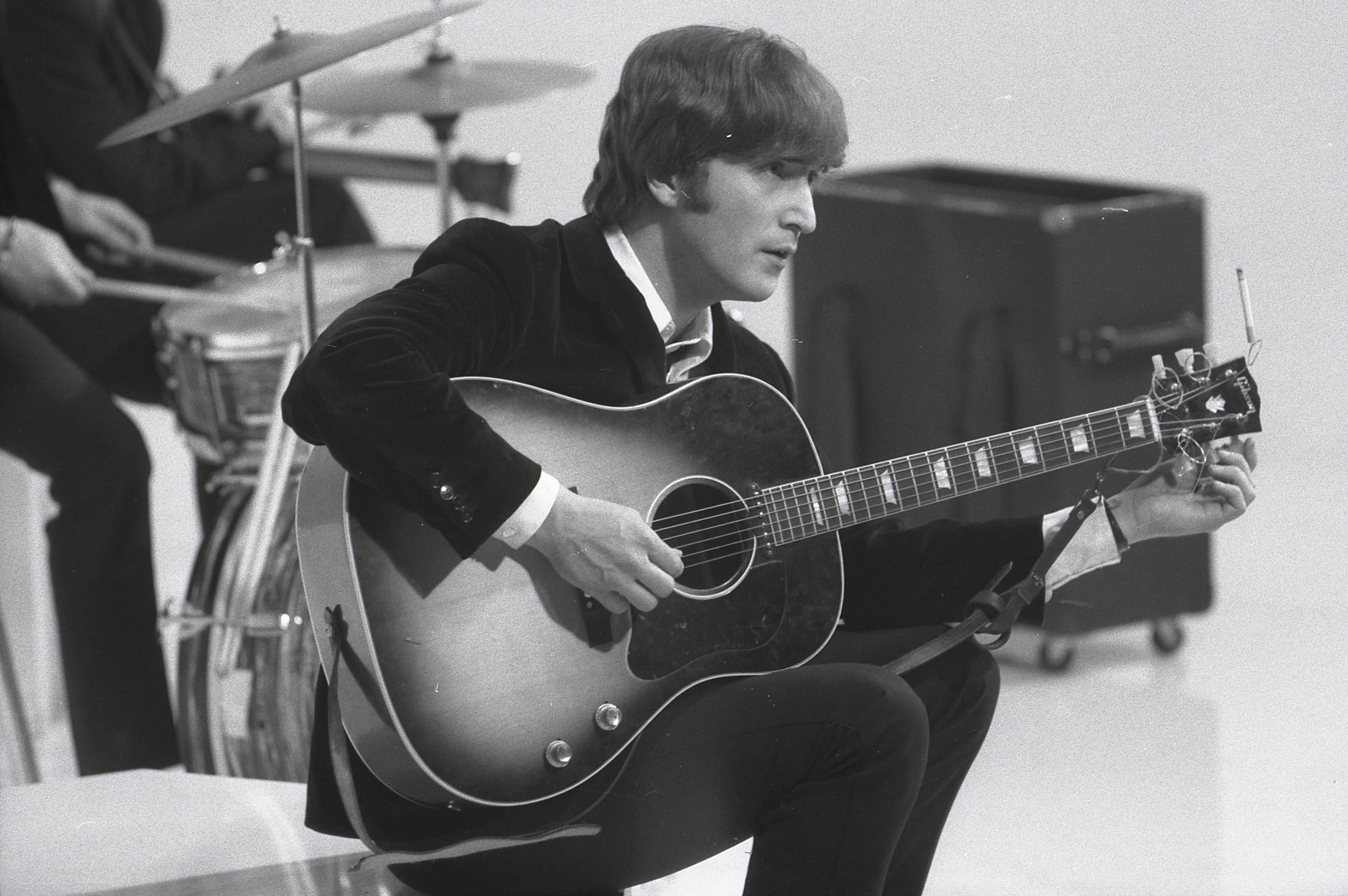 The Beatles' John Lennon with a guitar