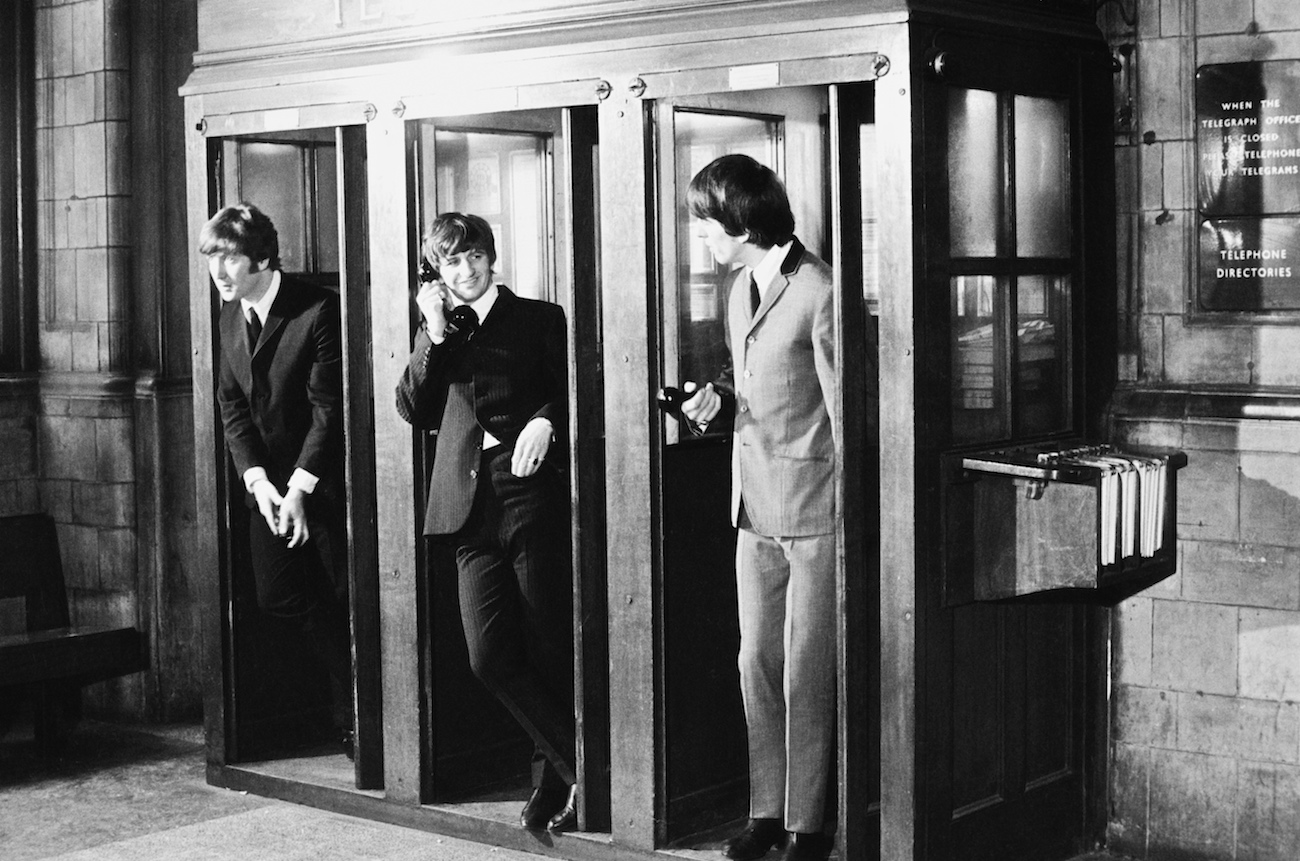John Lennon, Ringo Starr, and George Harrison on the set of 'A Hard Day's Night' in 1964.
