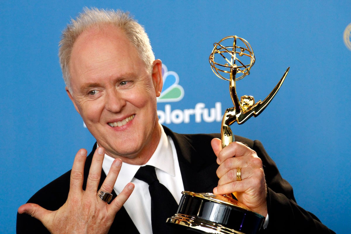 John Lithgow holds his Emmy for his work on Dexter