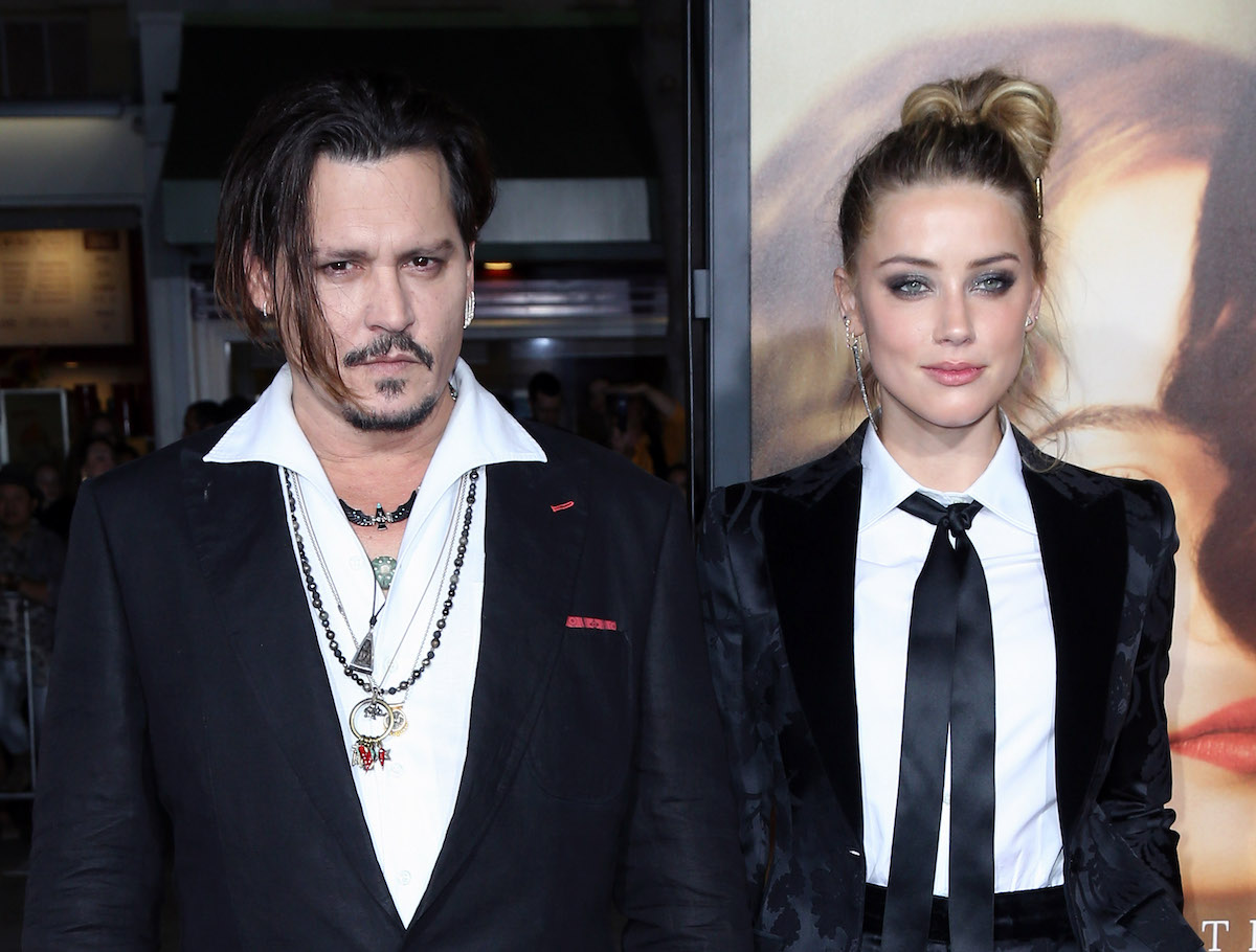 Johnny Depp and Amber Heard pose together at an event.