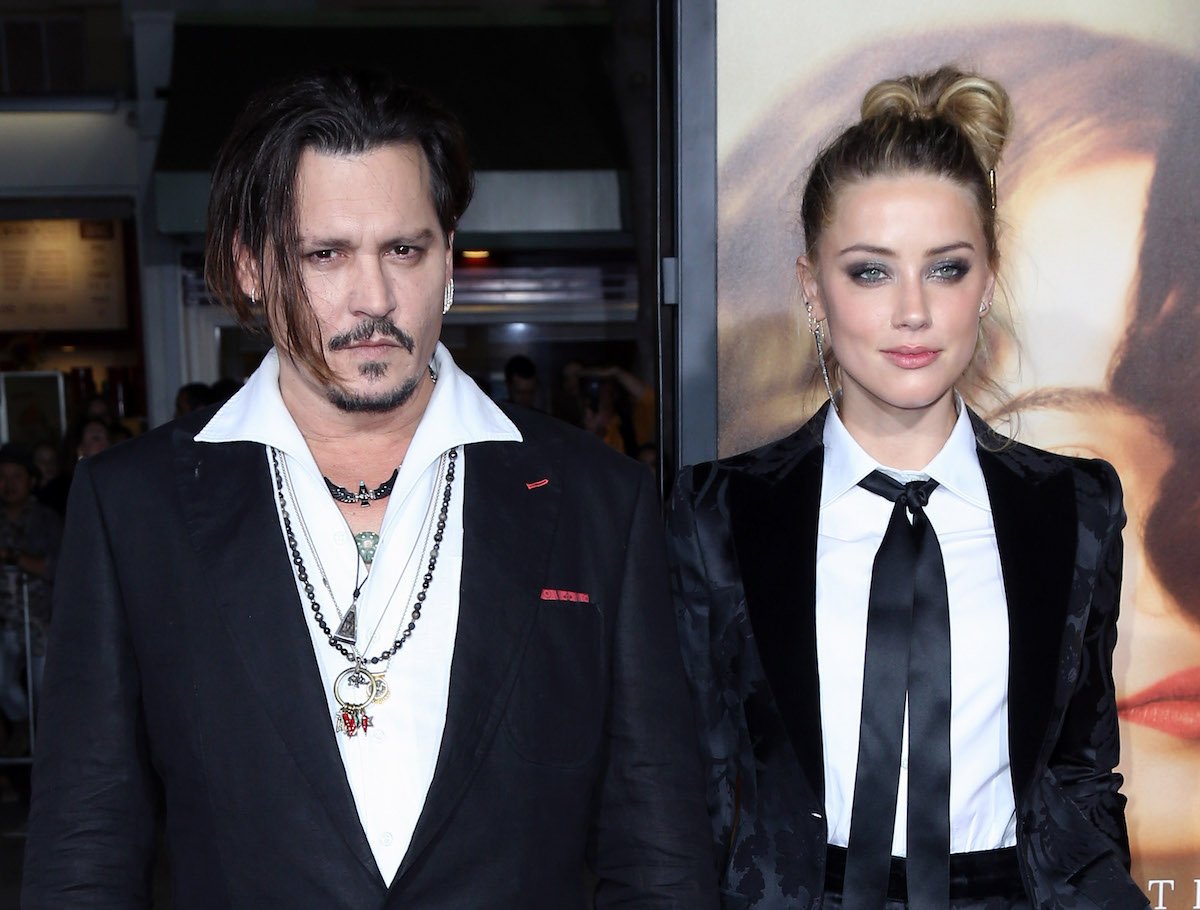 Johnny Depp and Amber Heard pose together at an event.