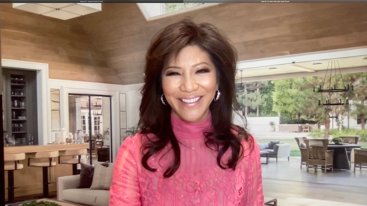 Julie Chen Moonves smiles in a pink turtleneck.