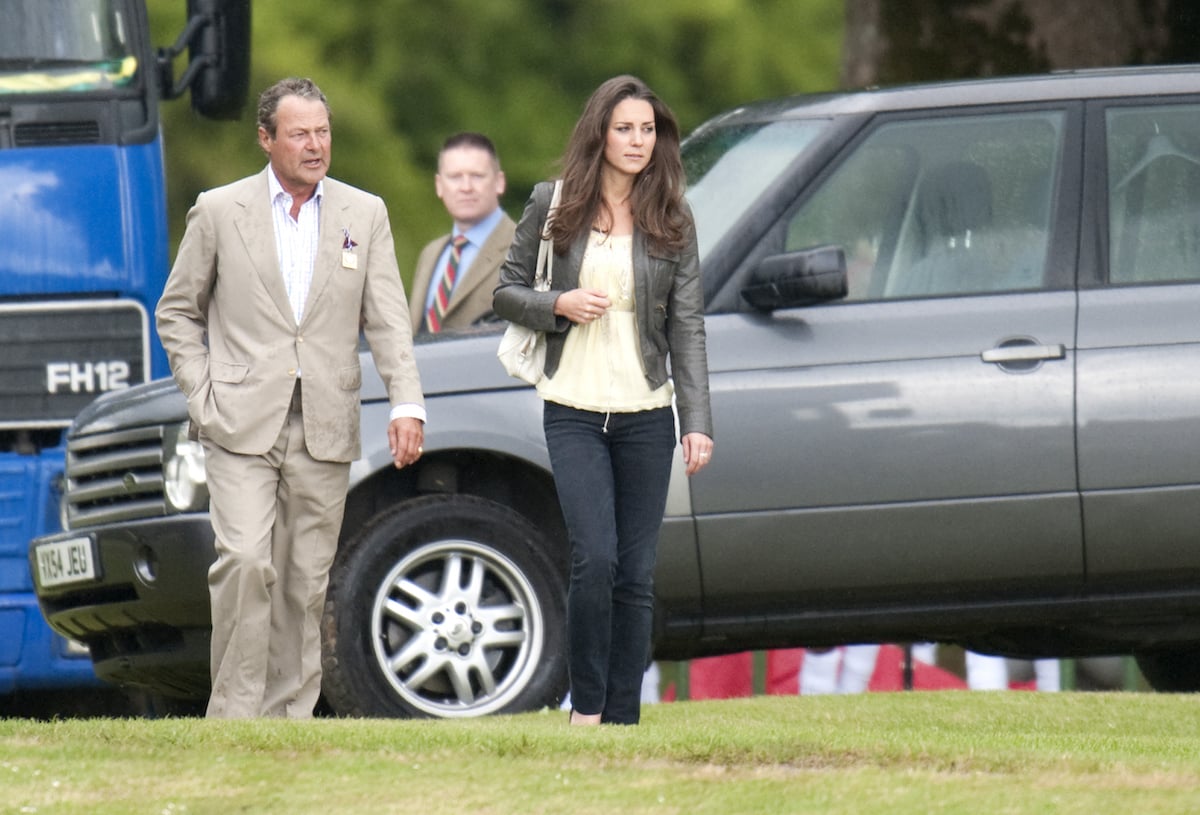 Kate Middleton, whose style helped her create an 'every girl image' wears jeans and a jacket at a polo match