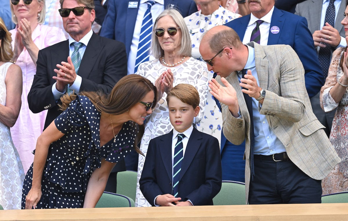 Kate Middleton and Prince William's Wimbledon body language mirrors each other as they lean in to speak to Prince George