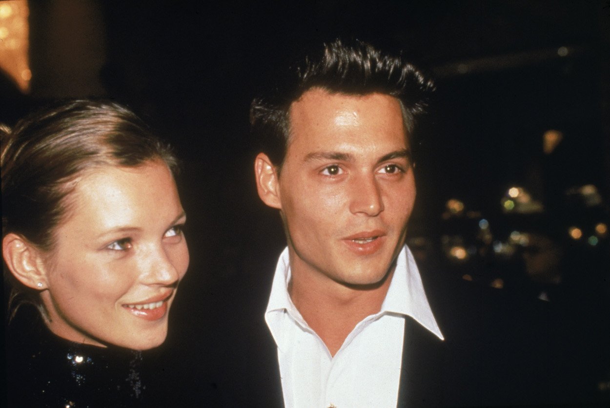 Kate Moss (left) and Johnny Depp at the 1995 Golden Globe Awards. Moss came to Depp's defense during his trial vs. Amber Heard, and it wasn't the first time she stood by a controversial figure.