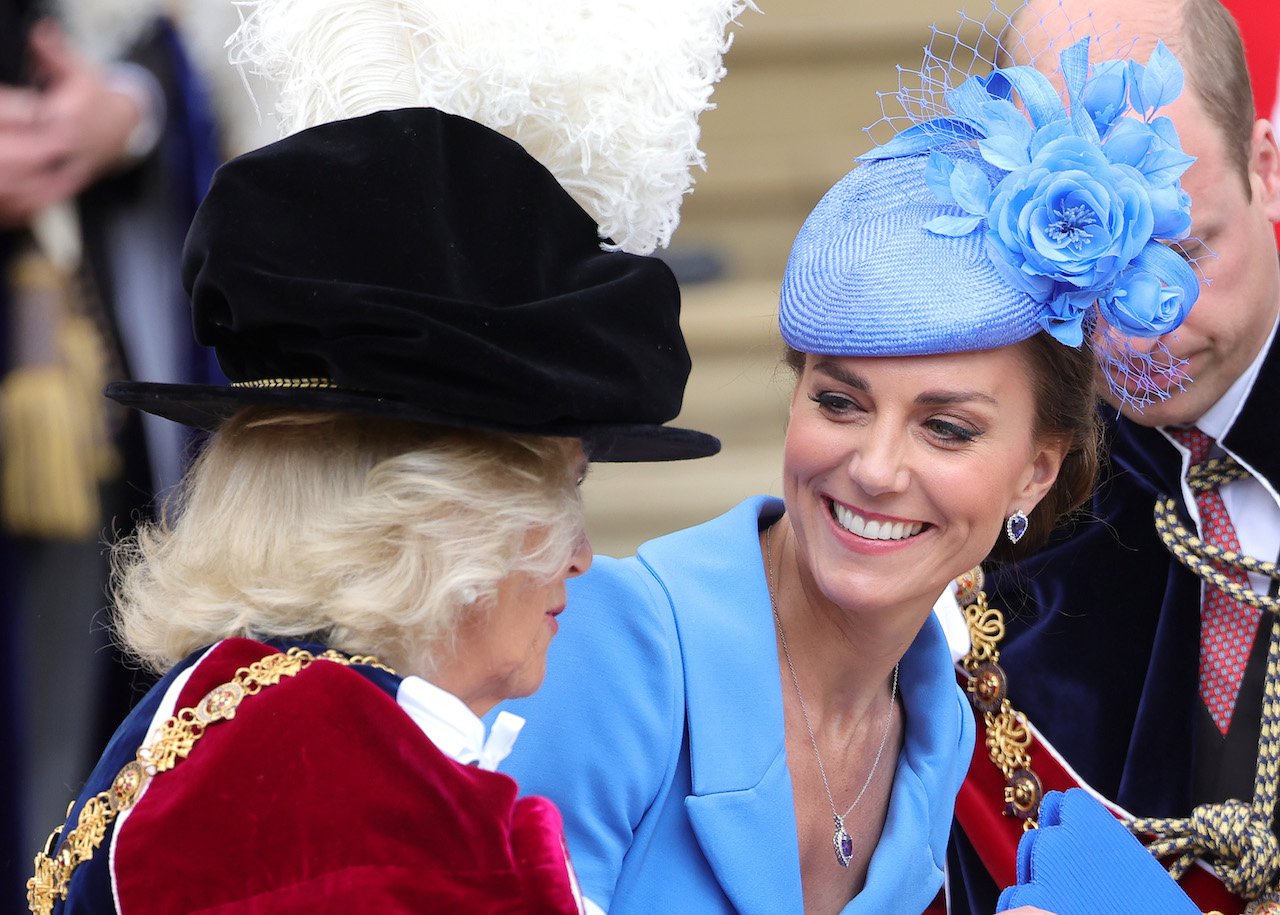 Kate Middleton and Camilla Parker Bowles, pictured sharing a smile at an event in 2022, have experienced changes in their relationship through the years