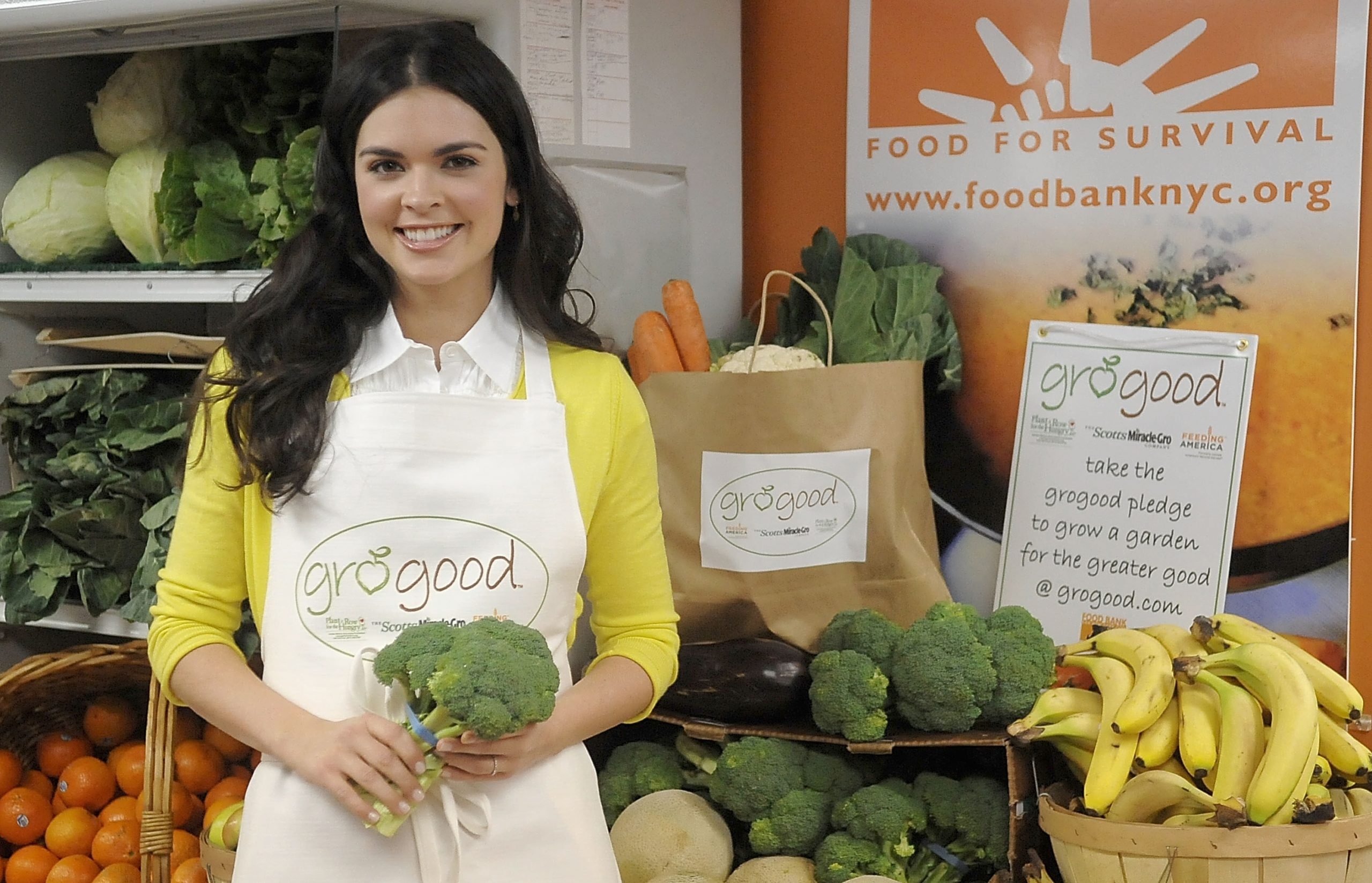 Celebrity chef Katie Lee Biegel wears a yellow blouse in this photograph.