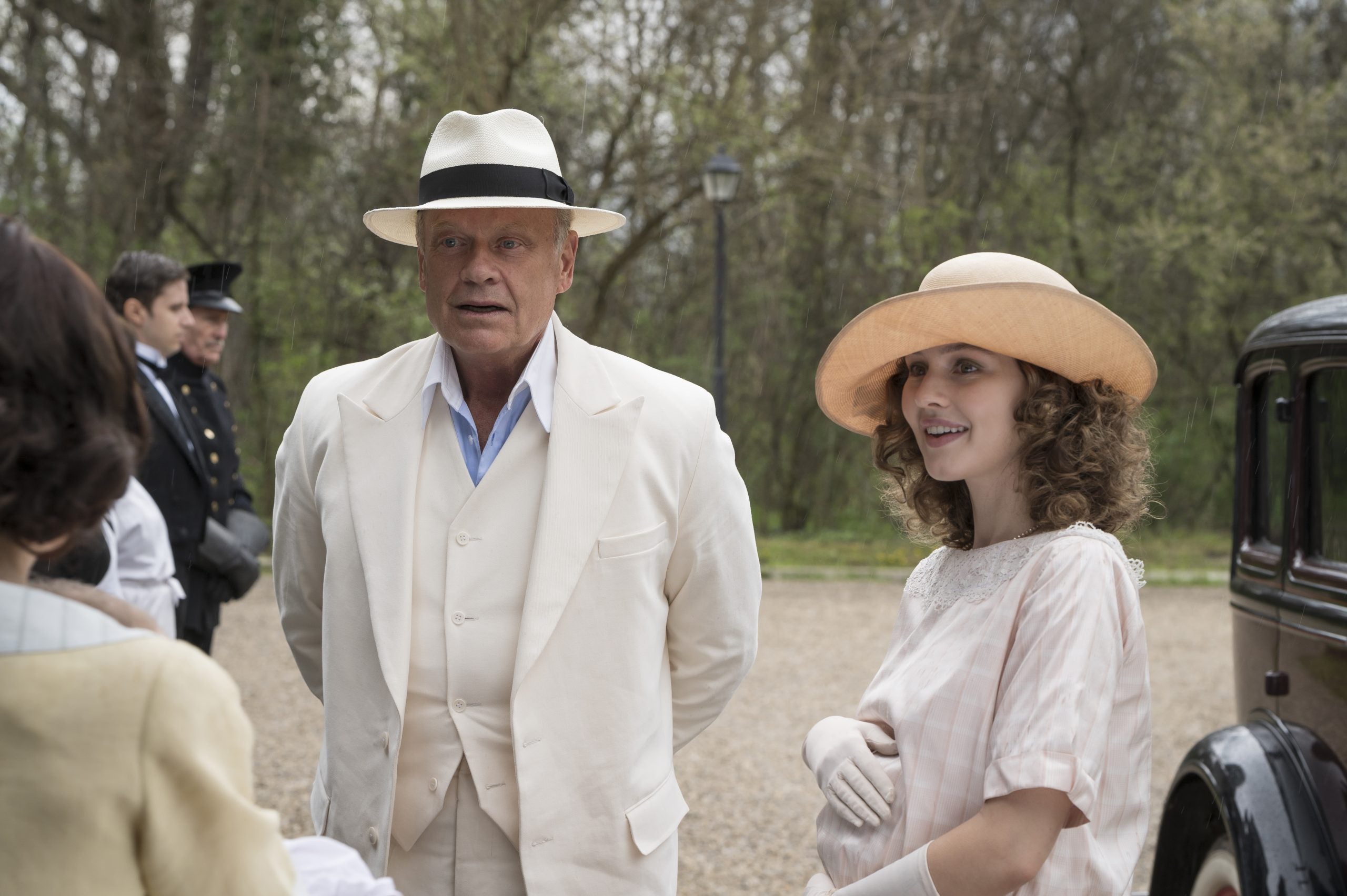 Kelsey Grammer in a white suit and Alana Boden in a hat in 'Flowers in the Attic: The Origin'