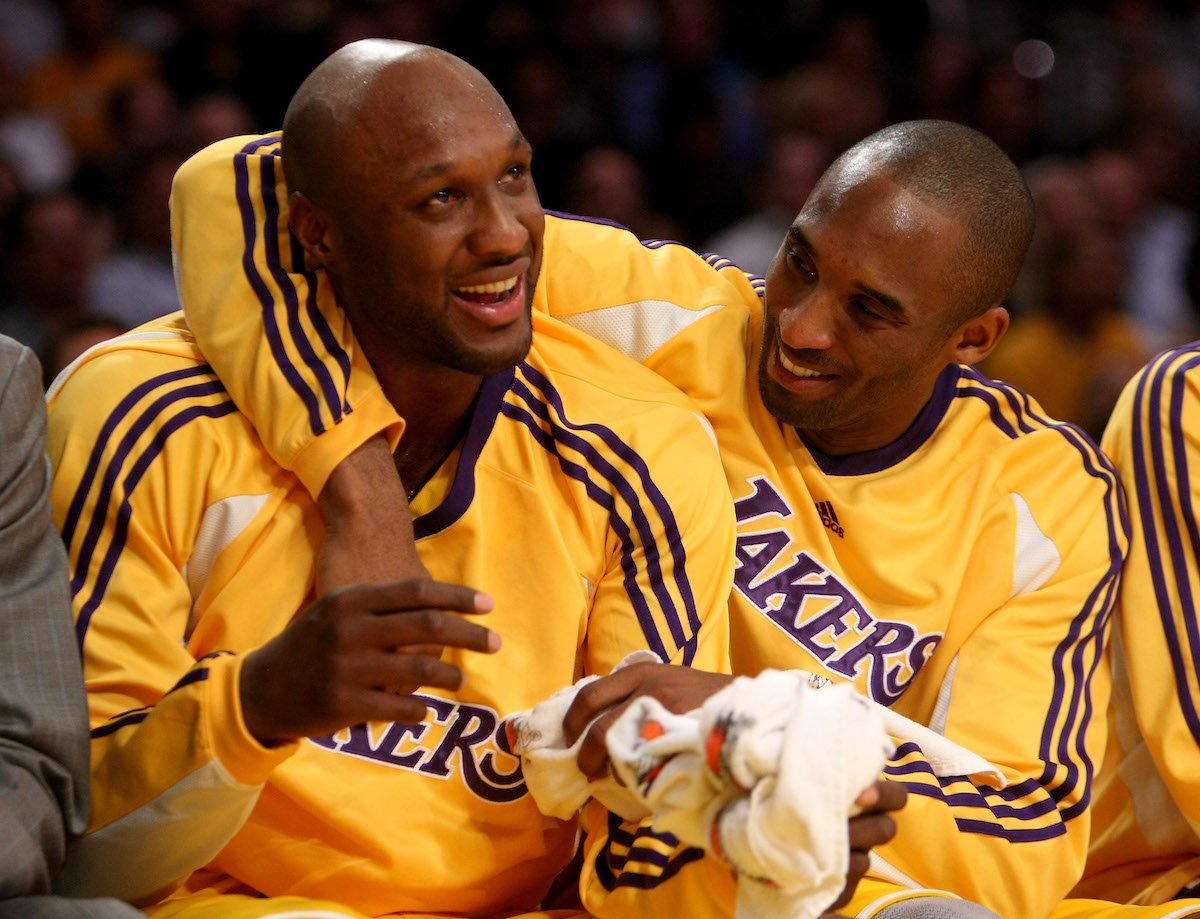 Lamar Odom and Kobe Bryant of the Los Angeles Lakers have a playful moment on the bench after Odom fouled out