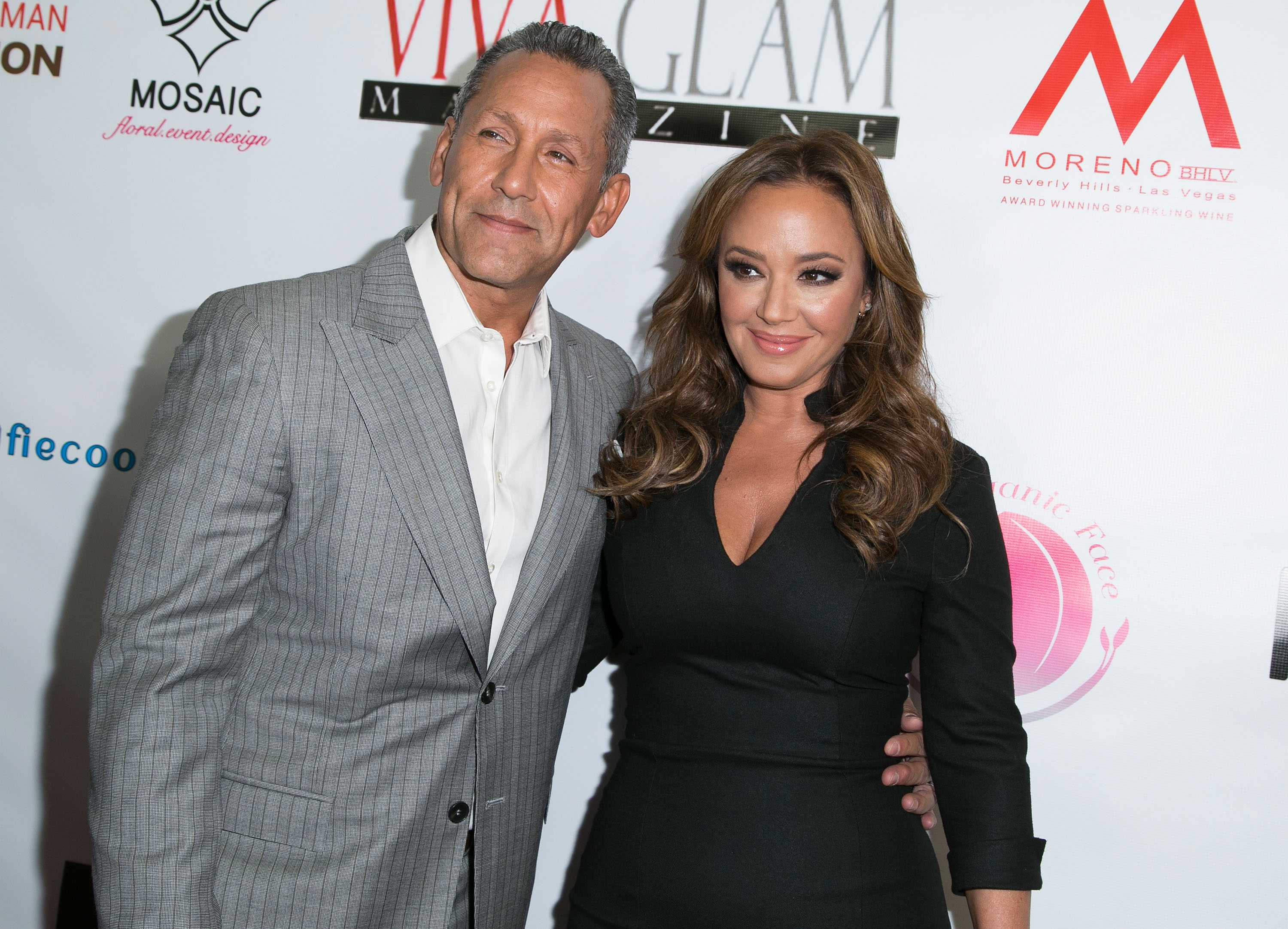 Leah Remini and her husband Angelo Pagan, who has three children from a previous relationship, attend the launch of VIVA GLAM Magazine's Celebrity Issue