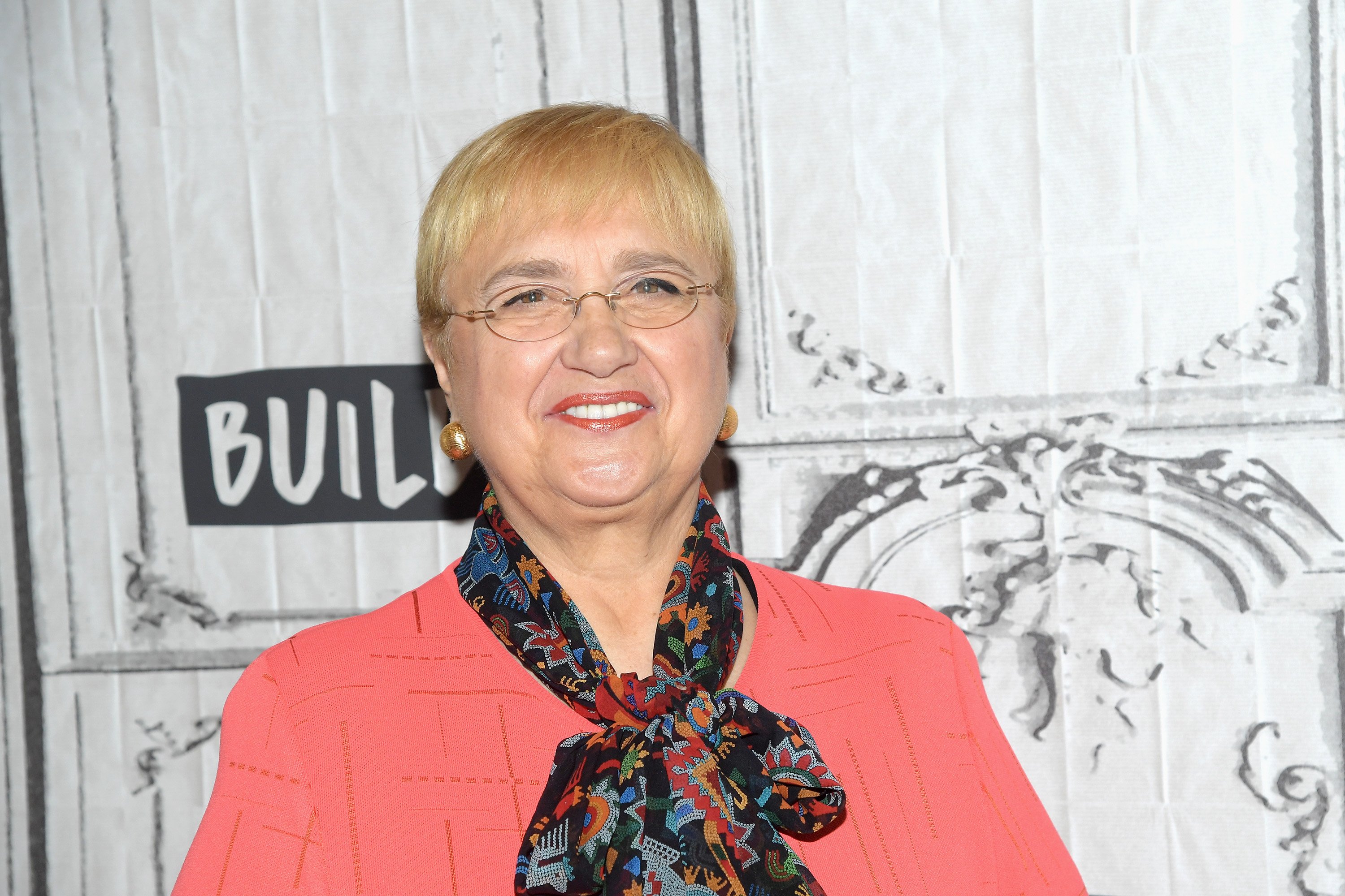 Celebrity chef Lidia Bastianich wears a pink blouse in this photograph.