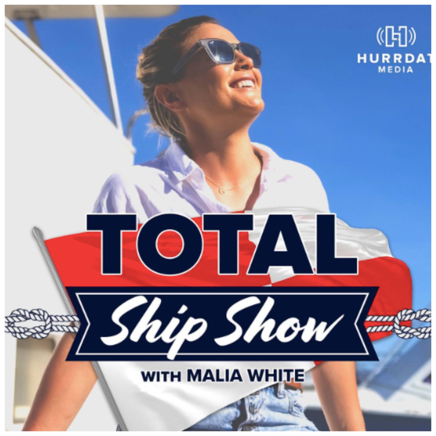 Malia White smiles in front of the 'Total Ship Show' logo
