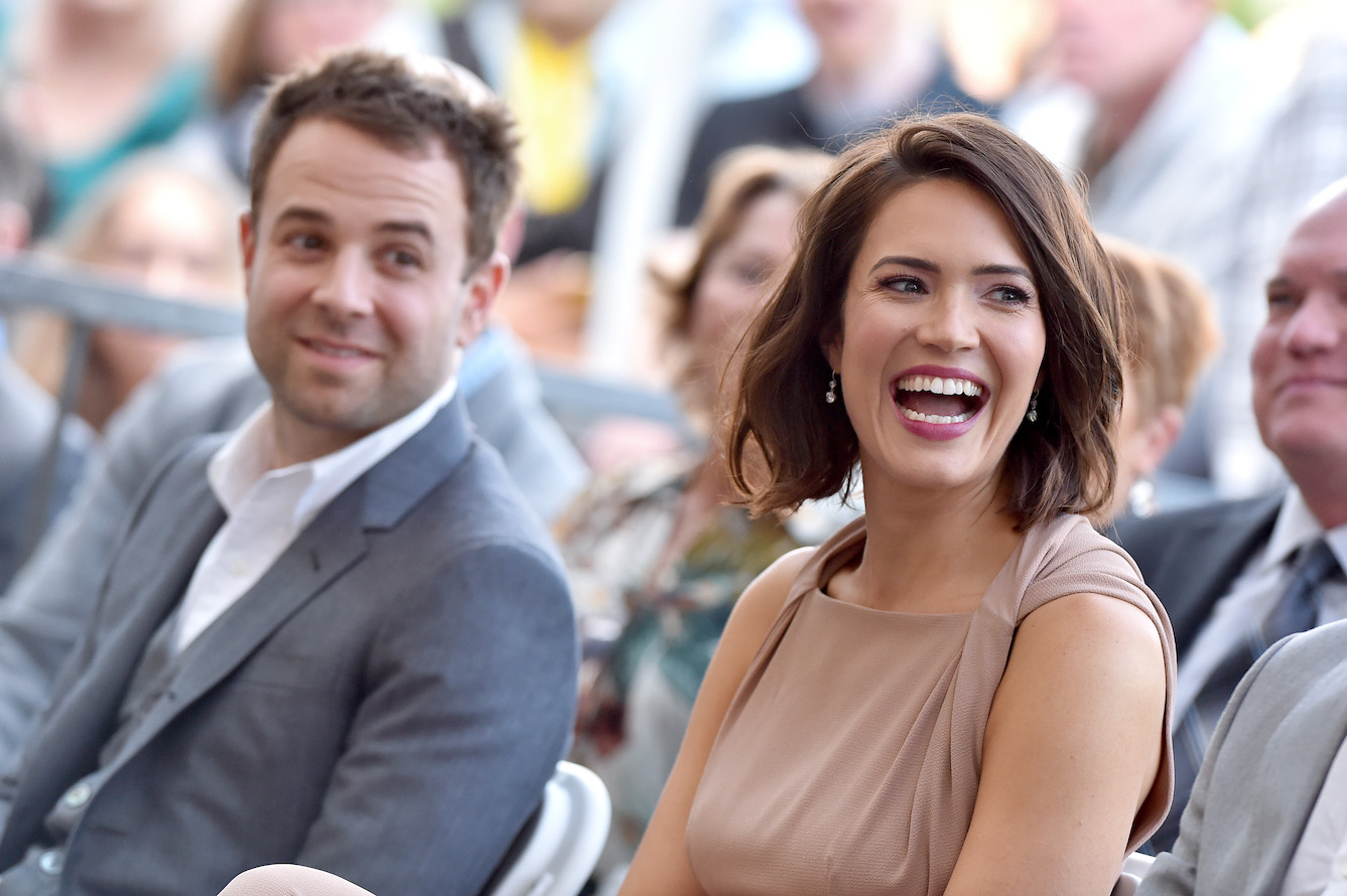 Mandy Moore and Taylor Goldsmith smiling