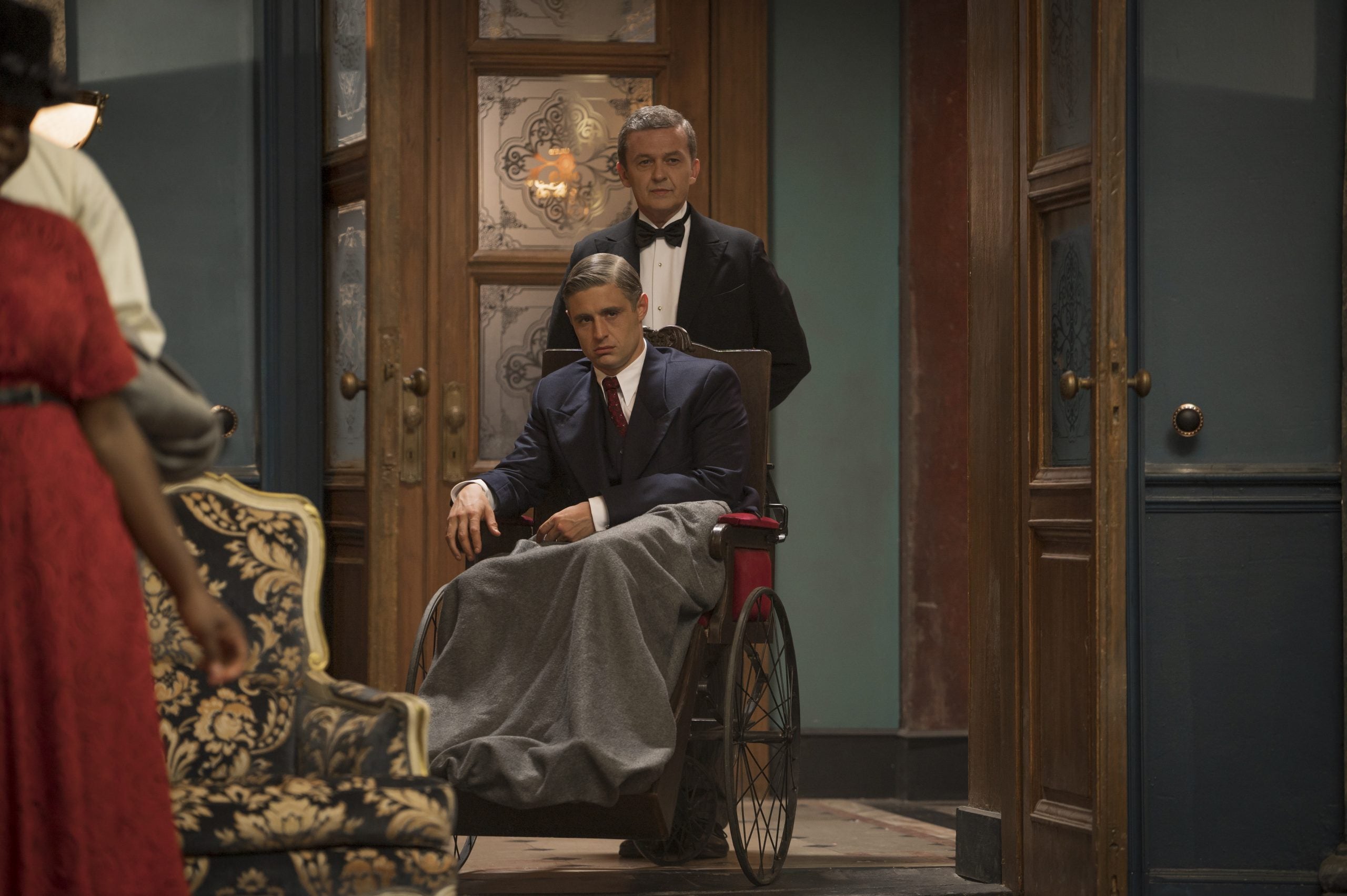 Max Irons as Malcolm Foxworth, sitting in a wheelchair, in 'Flowers in the Attic: The Origin'