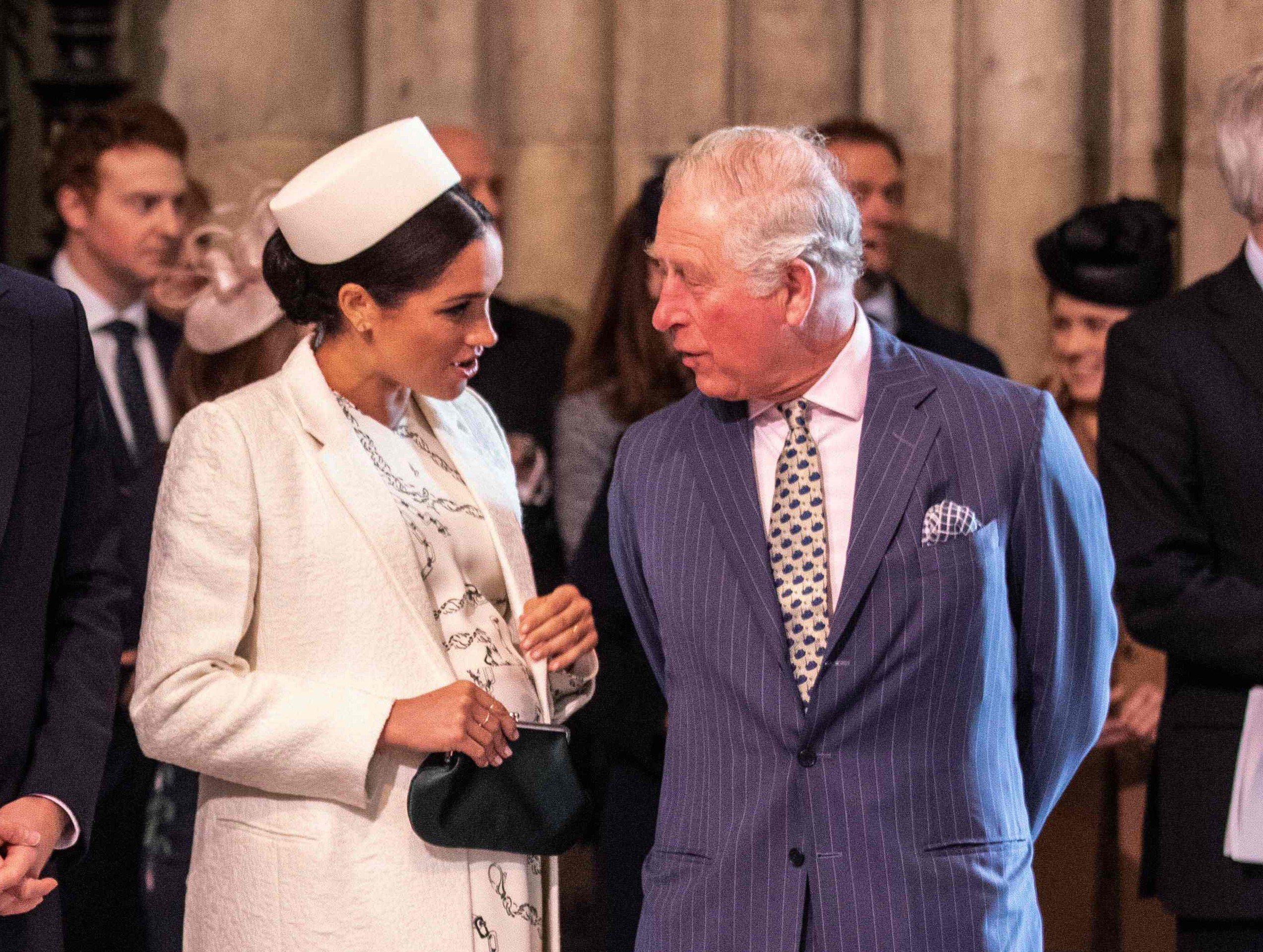 Meghan Markle and Prince Charles, who reportedly asked the duchess to shut up Thomas Markle, talk during the 2019 Commonwealth Day service at Westminster Abbey