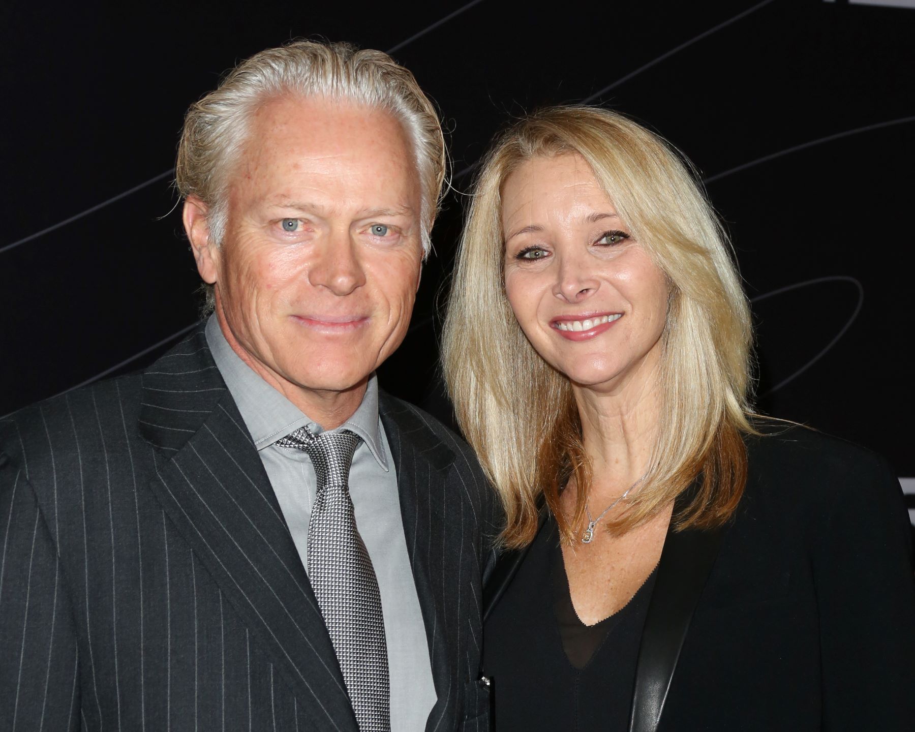Husband and wife Michel Stern and Lisa Kudrow at the Peterson Automotive Museum grand re-opening gala