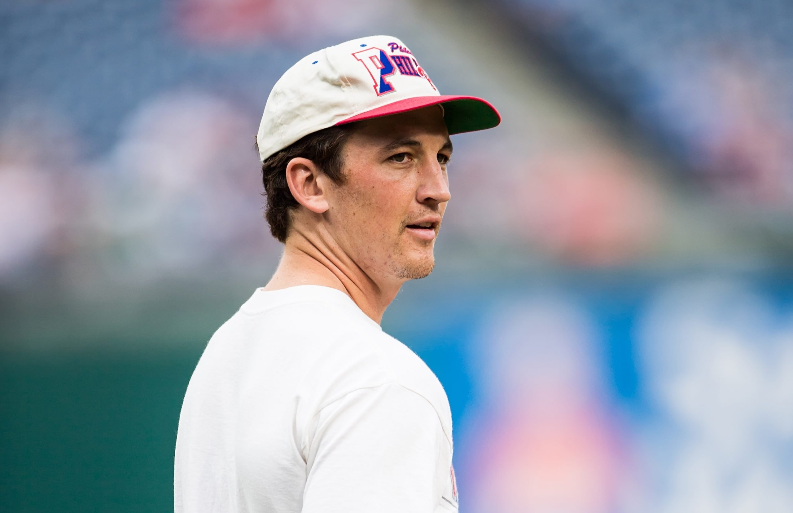 Actor Miles Teller throws the opening pitch at the San Francisco Giants vs. Philadelphia Phillies game