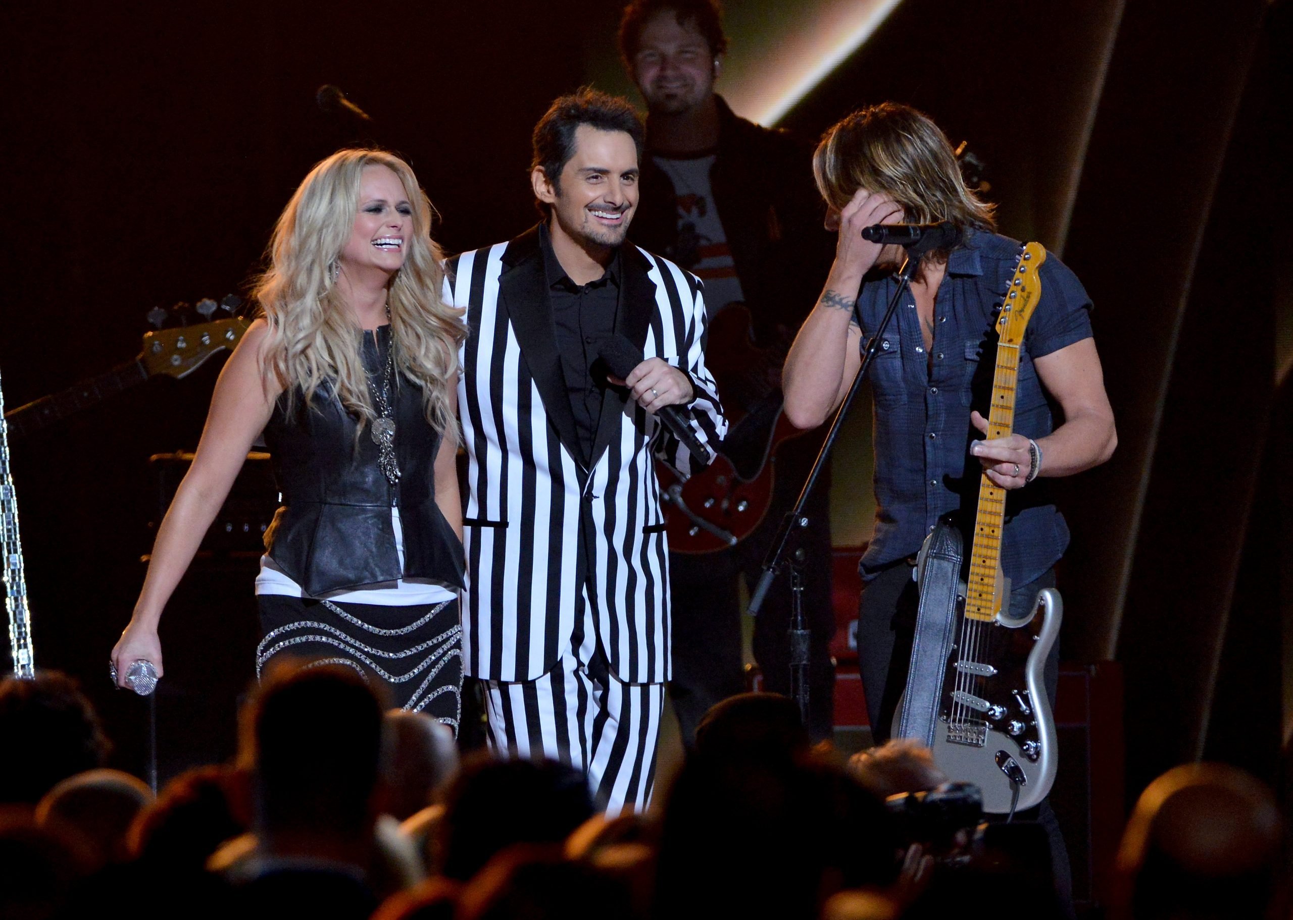 Miranda Lambert, Brad Paisley, and Keith Urban onstage during the 47th annual CMA awards