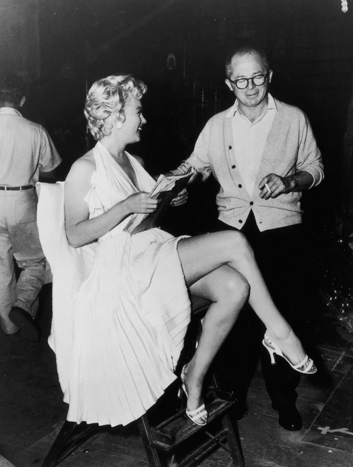Marilyn Monroe speaks with Billy Wilder on the set of 'The Seven Year Itch'