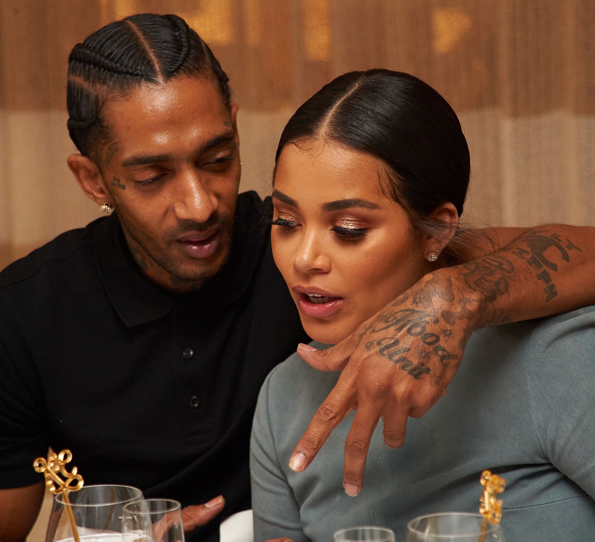 Nipsey Hussle and Lauren London embrace in photo; London says she felt God dropped the ball on her after Hussle's death