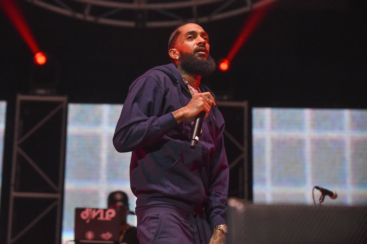 Nipsey Hussle on stage; Hussle's murder was found guilty of first-degree murder