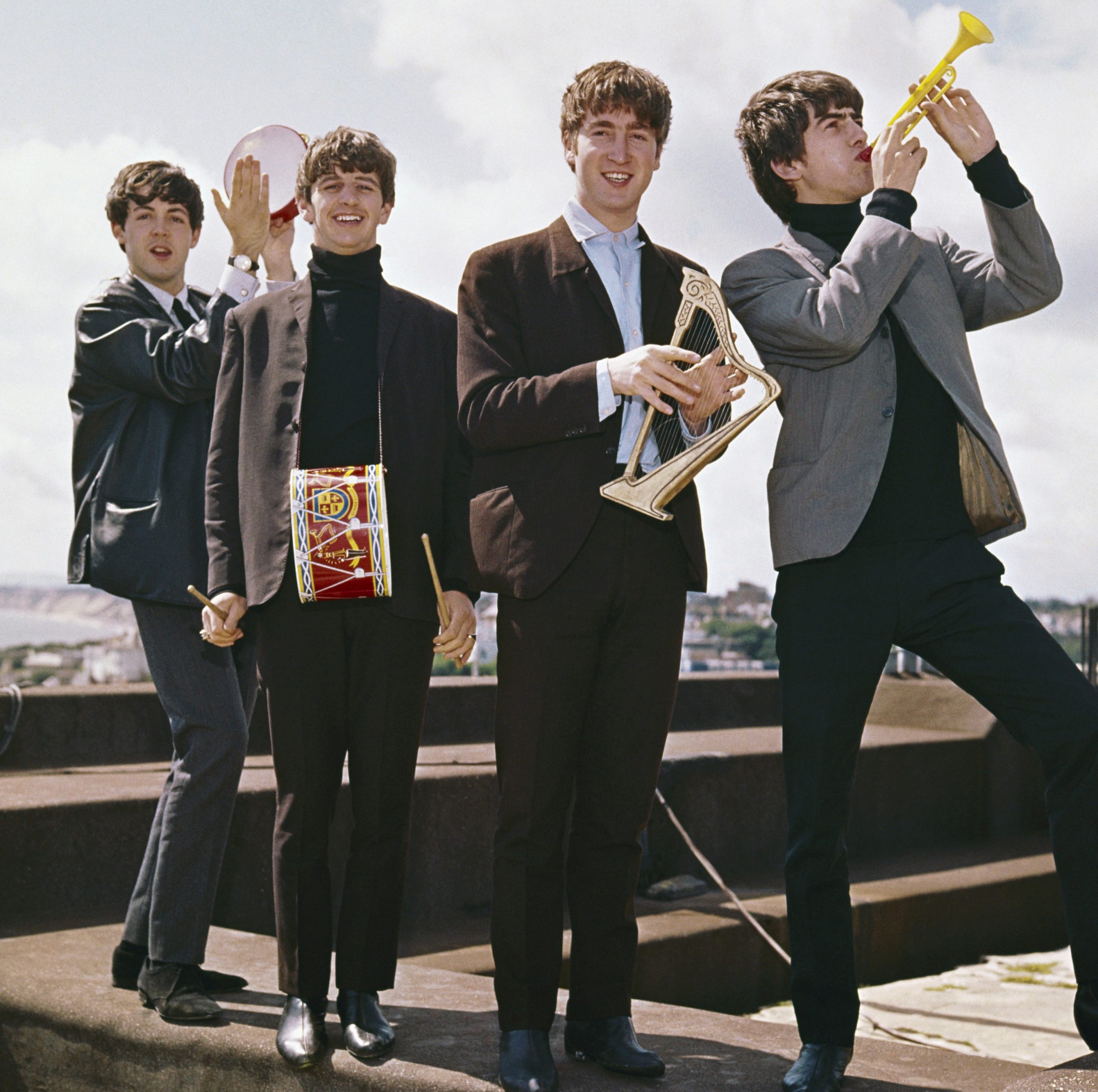 The Beatles' Paul McCartney, Ringo Starr, John Lennon, and George Harrison on a roof during the 'Revolver' era