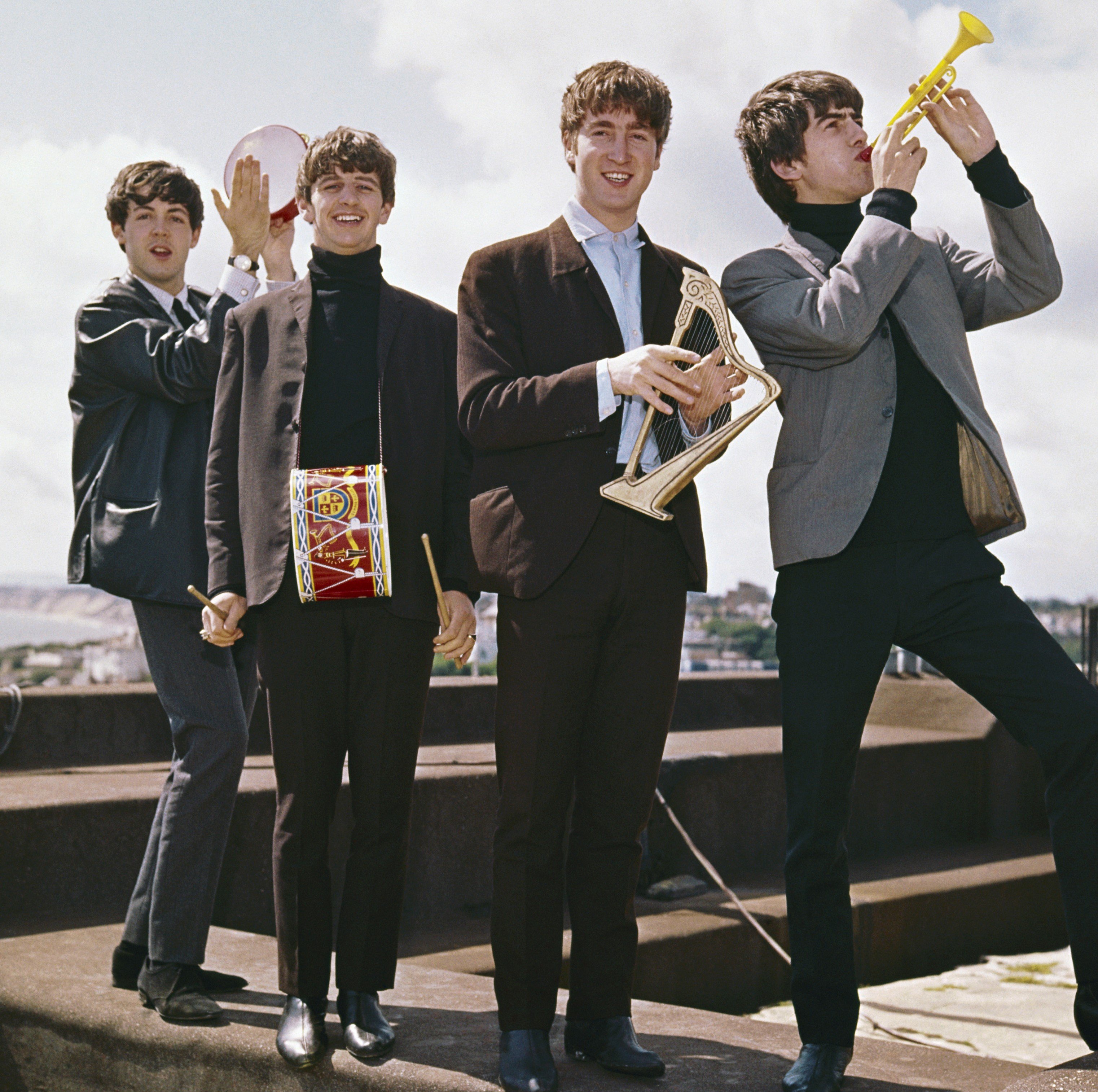 The Beatles' Paul McCartney, Ringo Starr, John Lennon, and George Harrison on a roof during the 'Revolver' era