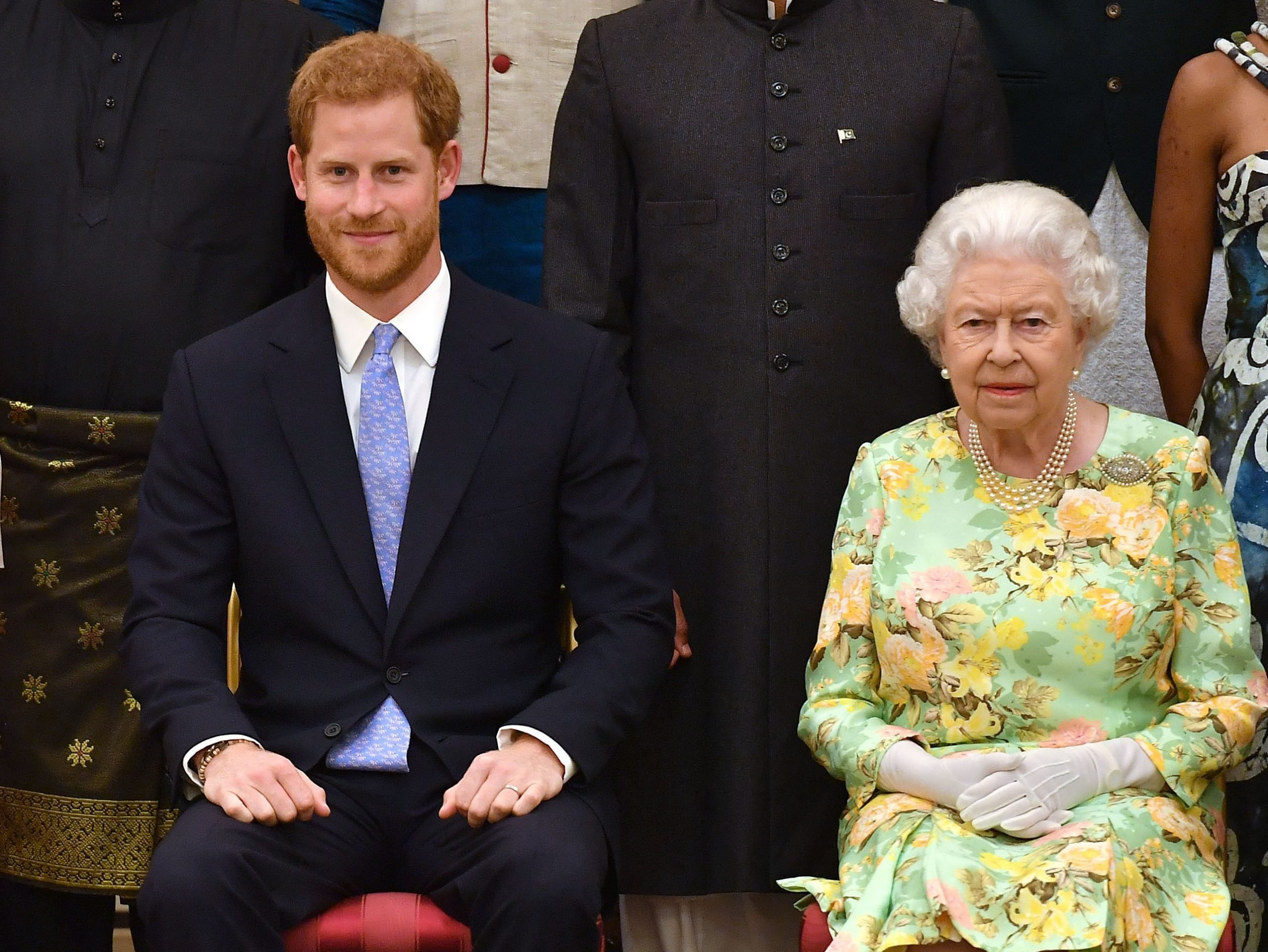 Prince Harry, who reportedly left something out when asking Queen Elizabeth II about Lilibet, sitting next to each other at the Queen's Young Leaders Awards Ceremony