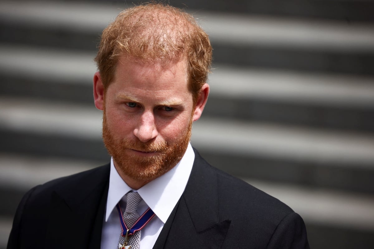 Prince Harry, whose 'The Me You Can't See' interview told the royal family he and Meghan Markle were 'beyond control' according to Tom Bower, looks on