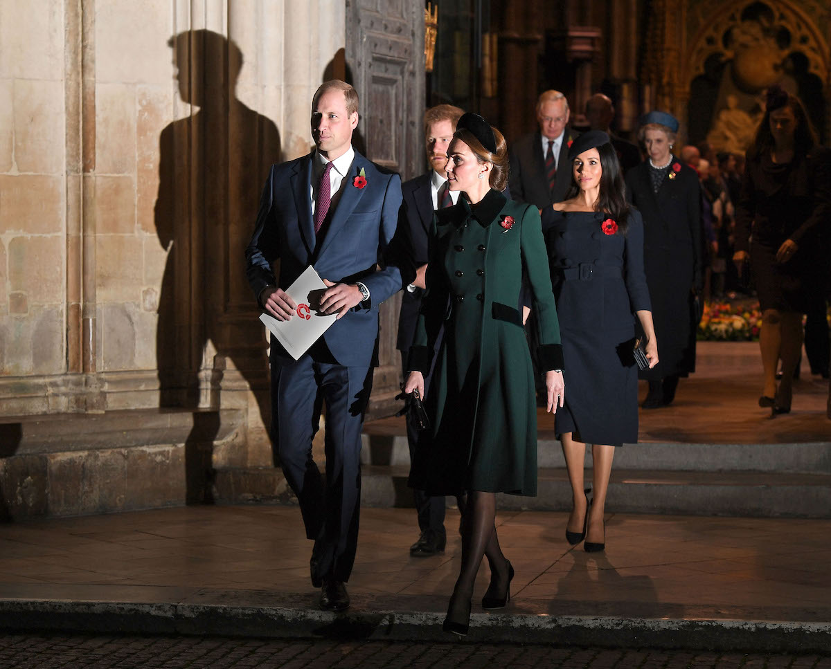Prince William, whose Earthshot Prize awards will be held in Boston, walks with Kate Middleton, Prince Harry, and Meghan Markle