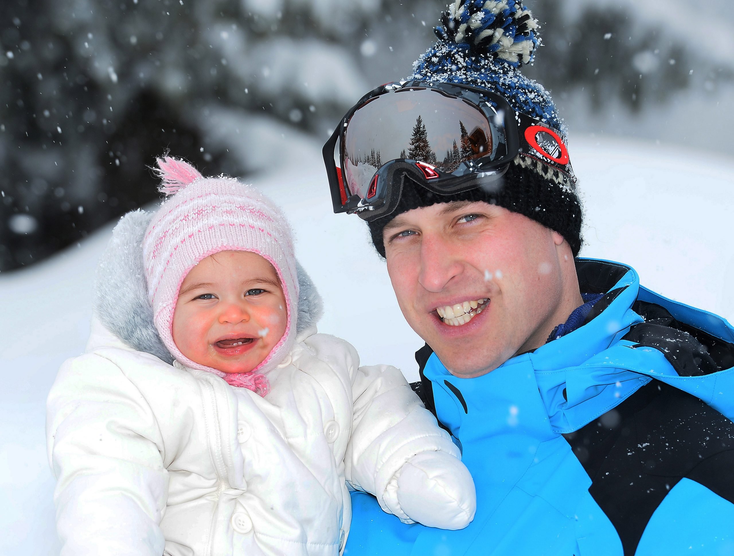 Prince William and Princess Charlotte smile during skiing trip