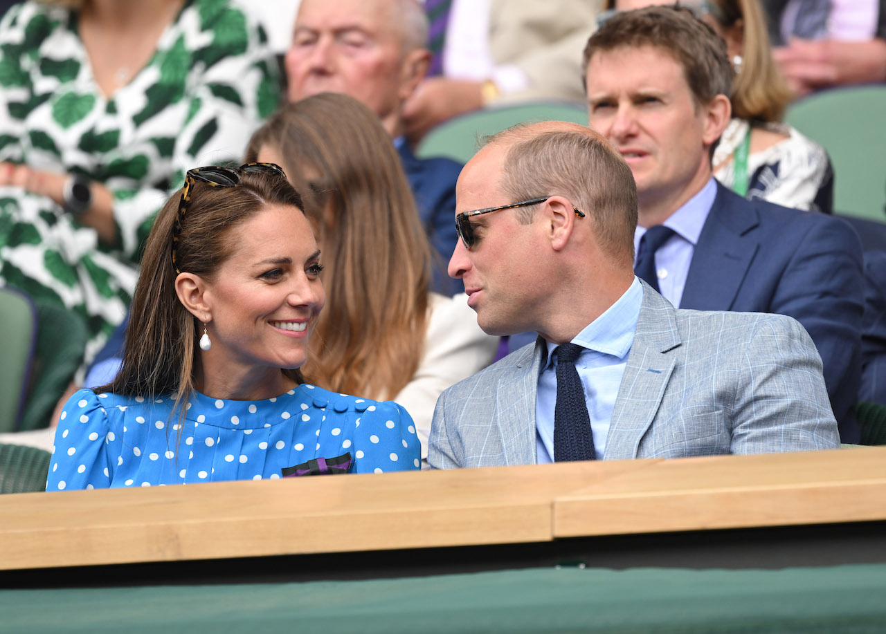 Kate Middleton and Prince William, pictured at Wimbledon in 2022, are happier than ever according to a friend