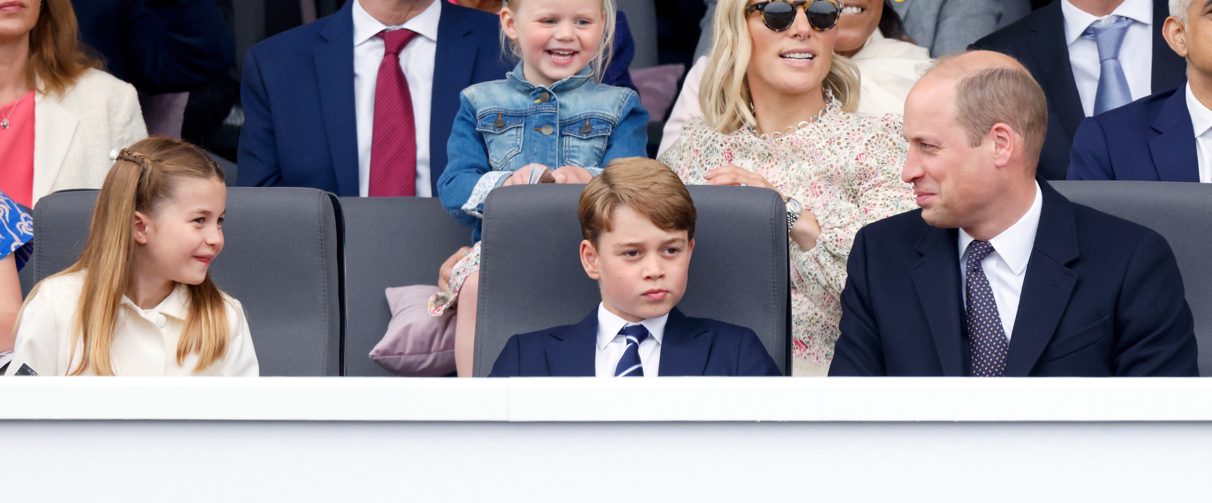 Photo of Prince George, as well as Princess Charlotte and Prince William who look alike in throwback photos, watching the Platinum Pageant during Queen Elizabeth II's Platinum Jubilee
