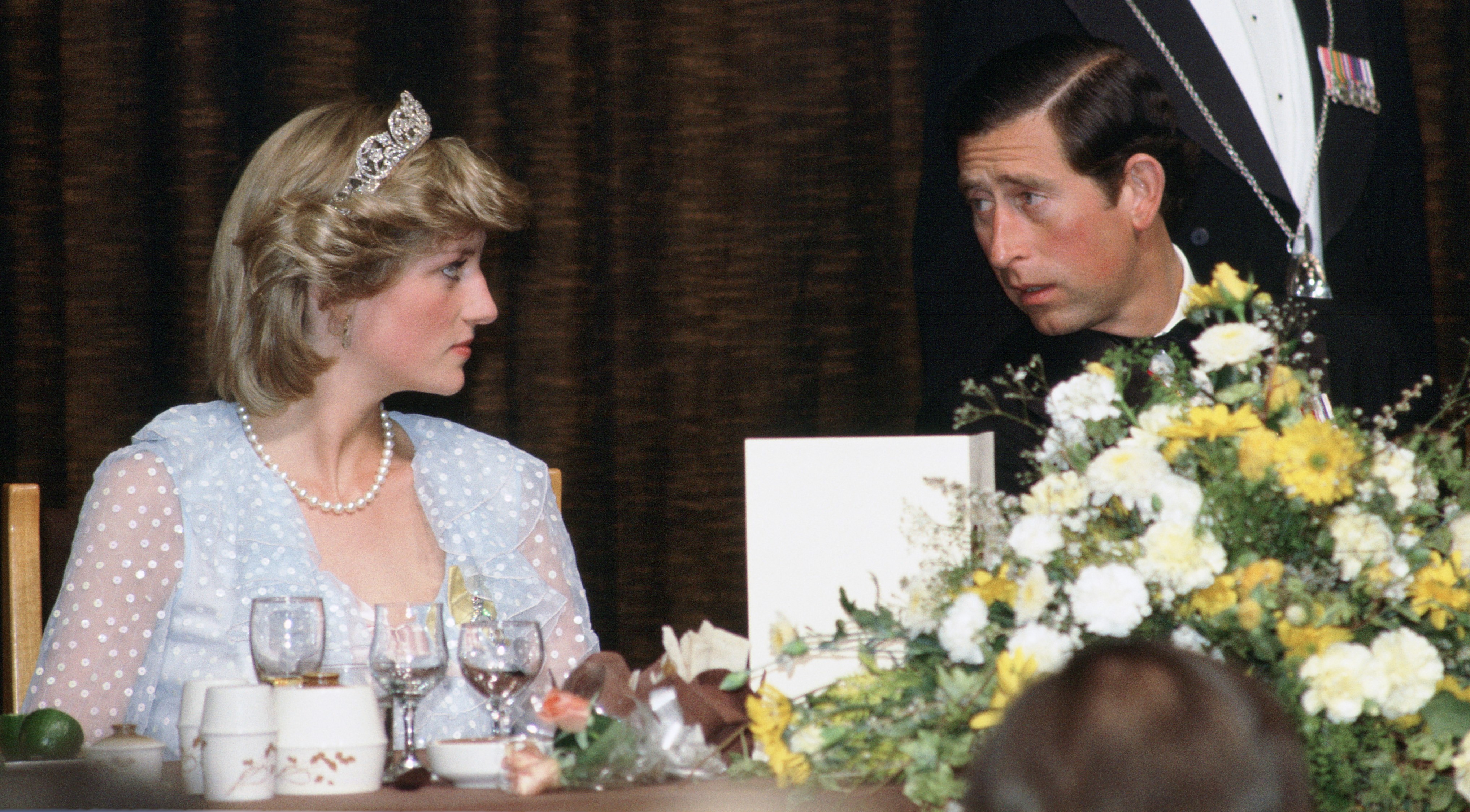 Princess Diana and Prince Charles, who may never be forgiven for how he treated his first wife, at a banquet dinner during their visit to New Zealand