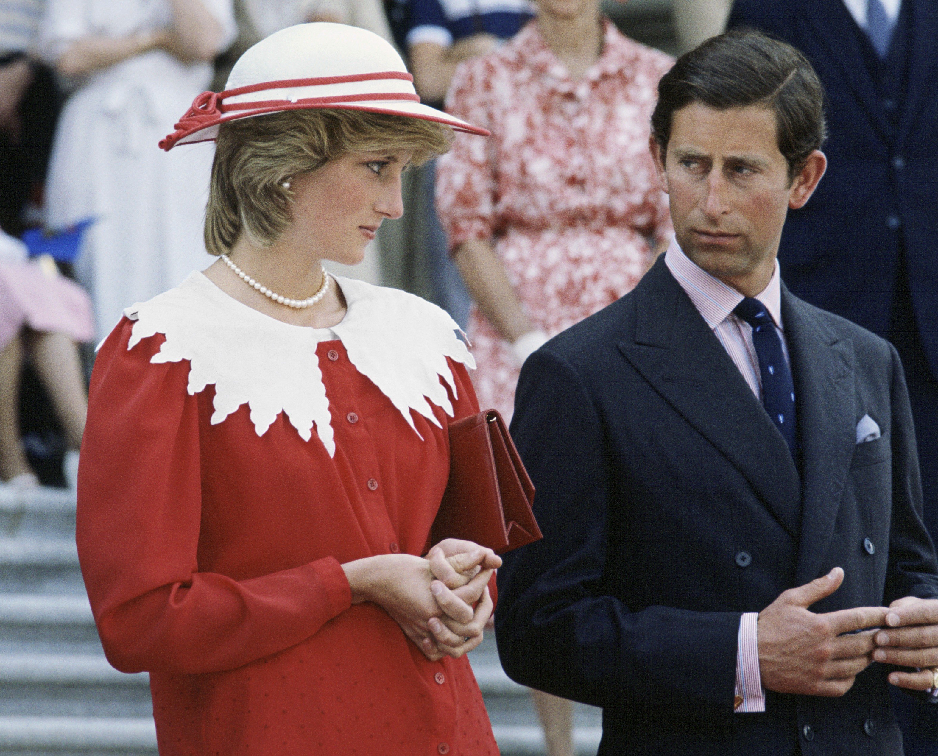 Princess Diana and Prince Charles looking unhappy at an event in Canada