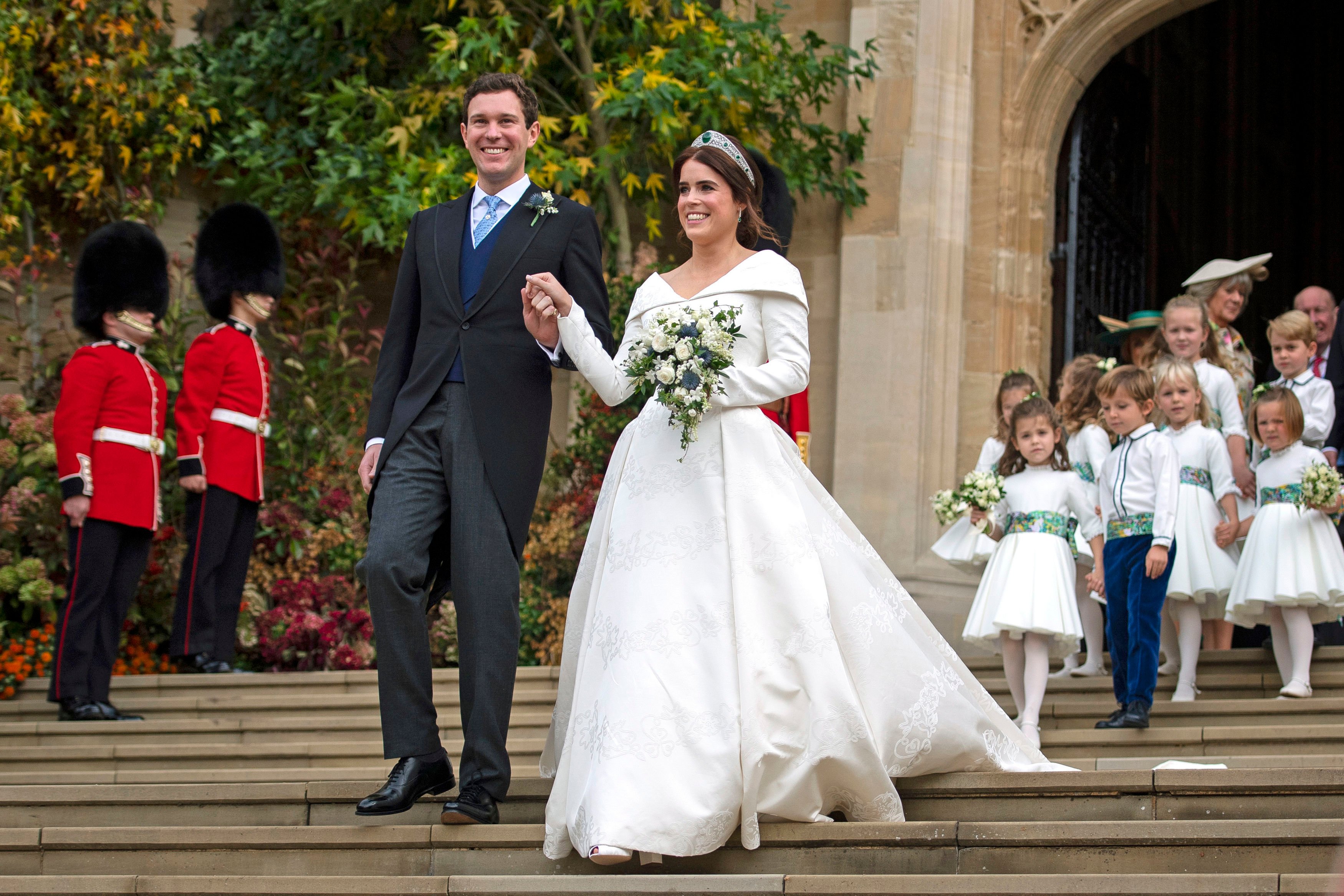 Princess Eugenie of York and Jack Brooksbank leave St George's Chapel in Windsor Castle following their wedding