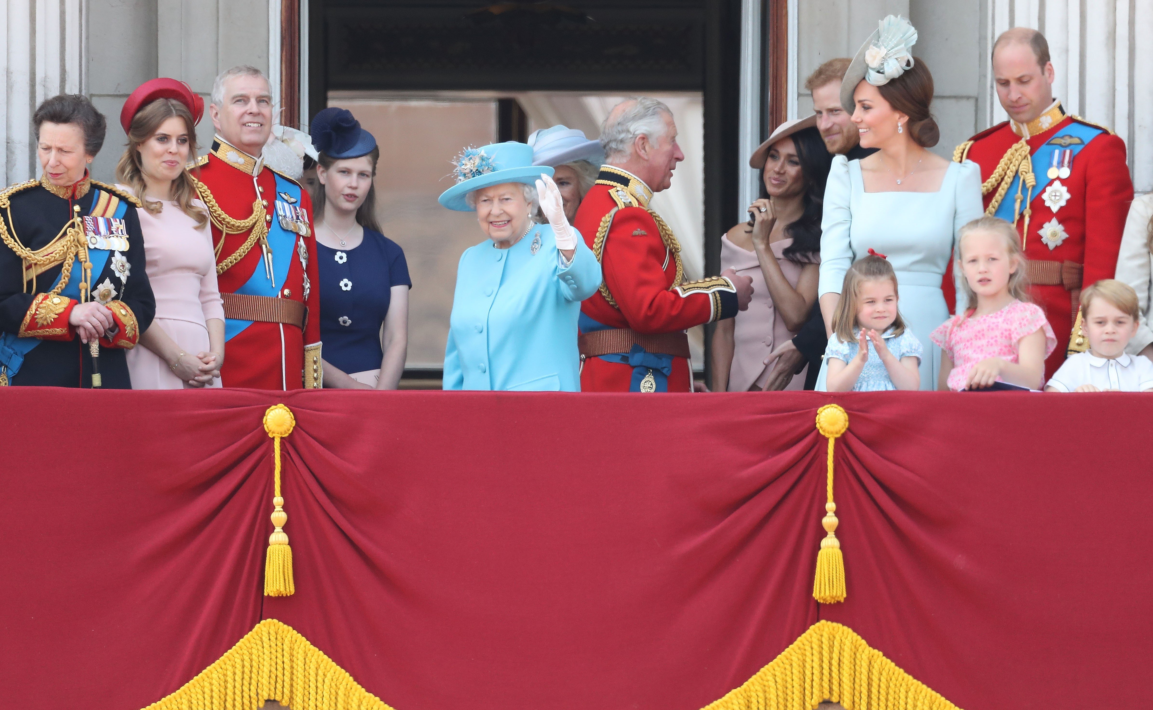 Members of royal family, including Queen Elizabeth II, watch a flypast on the balcony of Buckingham Palace during Trooping The Colour in 2018.