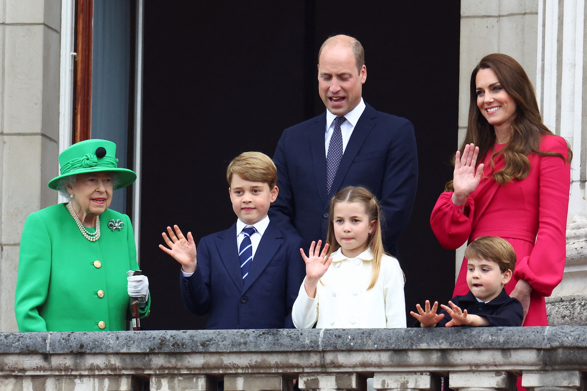 Queen Elizabeth II, who a royal commentator says will talk to Kate Middleton and Prince William about their helicopter use, stands with Prince George, Prince William, Princess Charlotte, Kate Middleton, and Prince Louis
