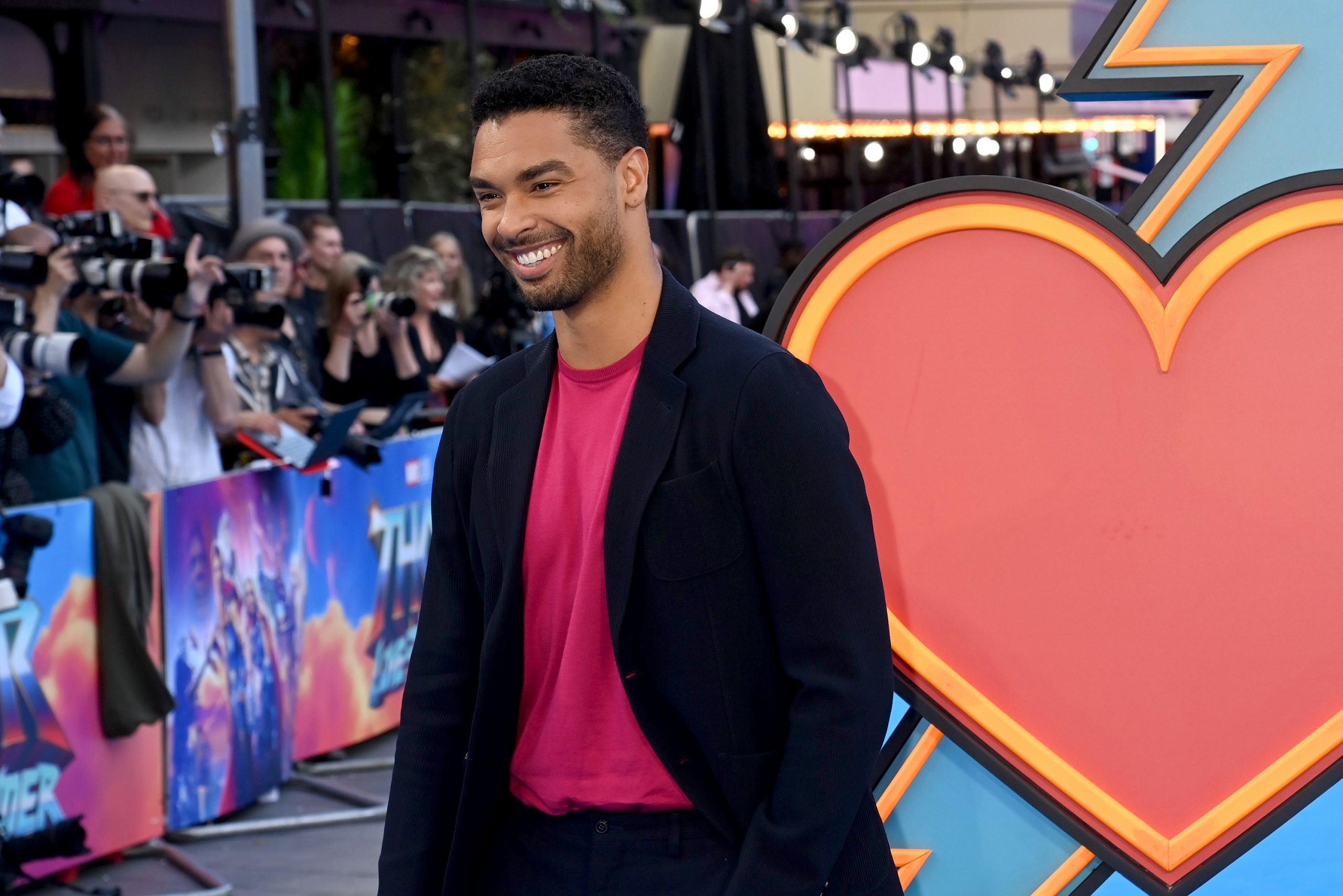 Regé-Jean Page smiling at the UK 'Thor: Love and Thunder' premiere in London