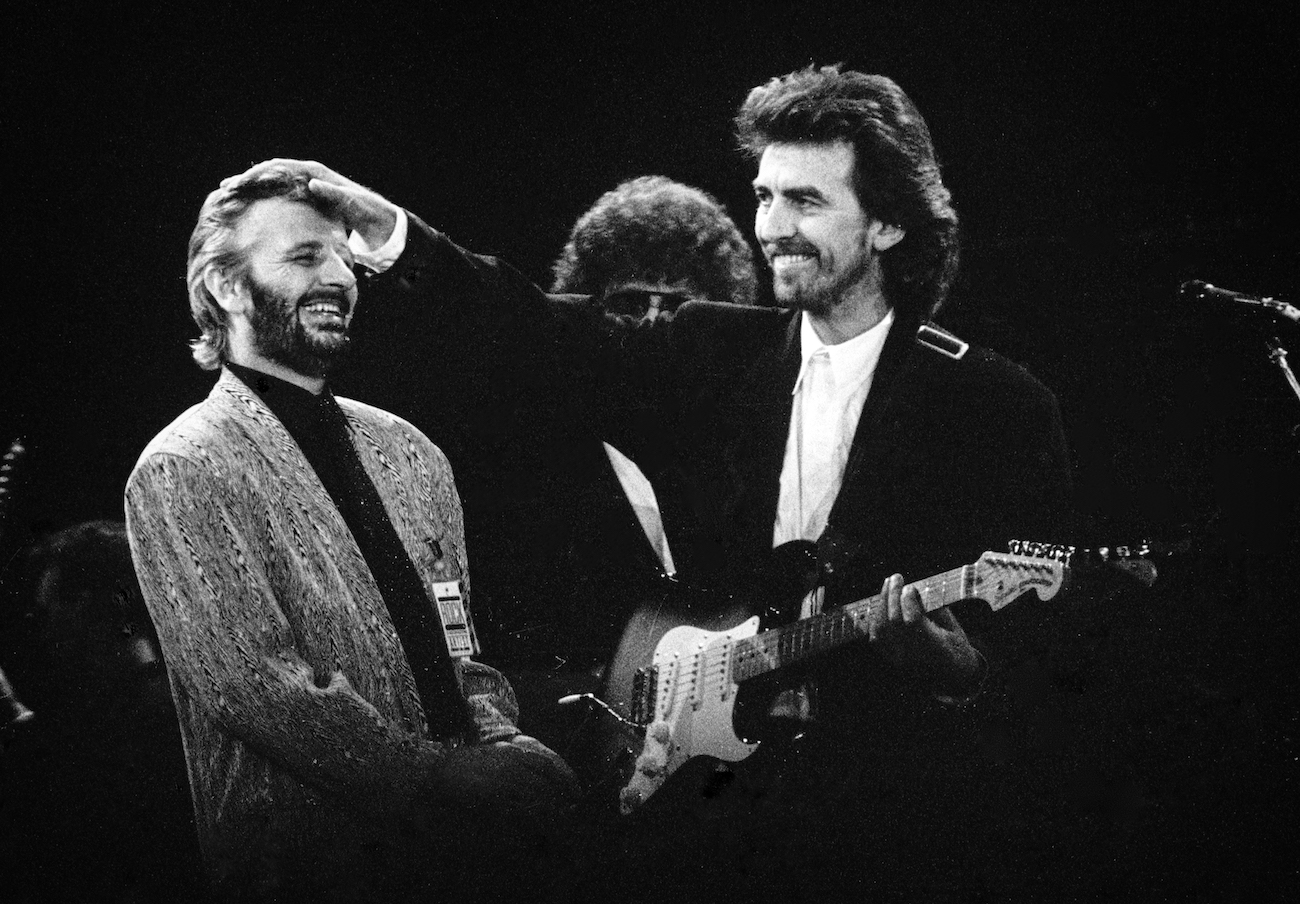 Beatles Ringo Starr and George Harrison performing at the Prince's Trust Concert in 1987.