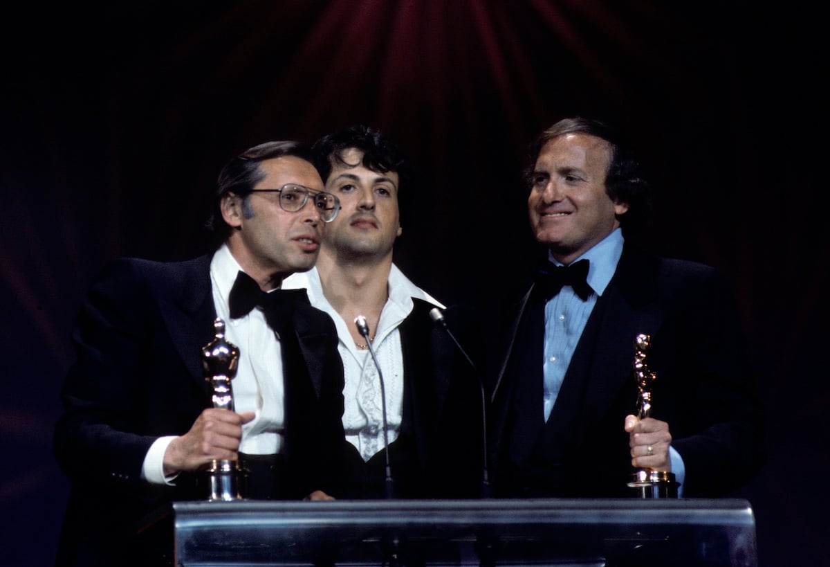 Irwin Winkler, Sylvester Stallone, and Robert Chartoff at the 49th annual Academy Awards in 1977