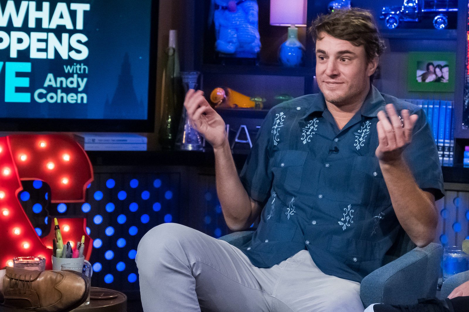 Shep Rose from 'Southern Charm' shrugs in the 'WWHL' Clubhouse 