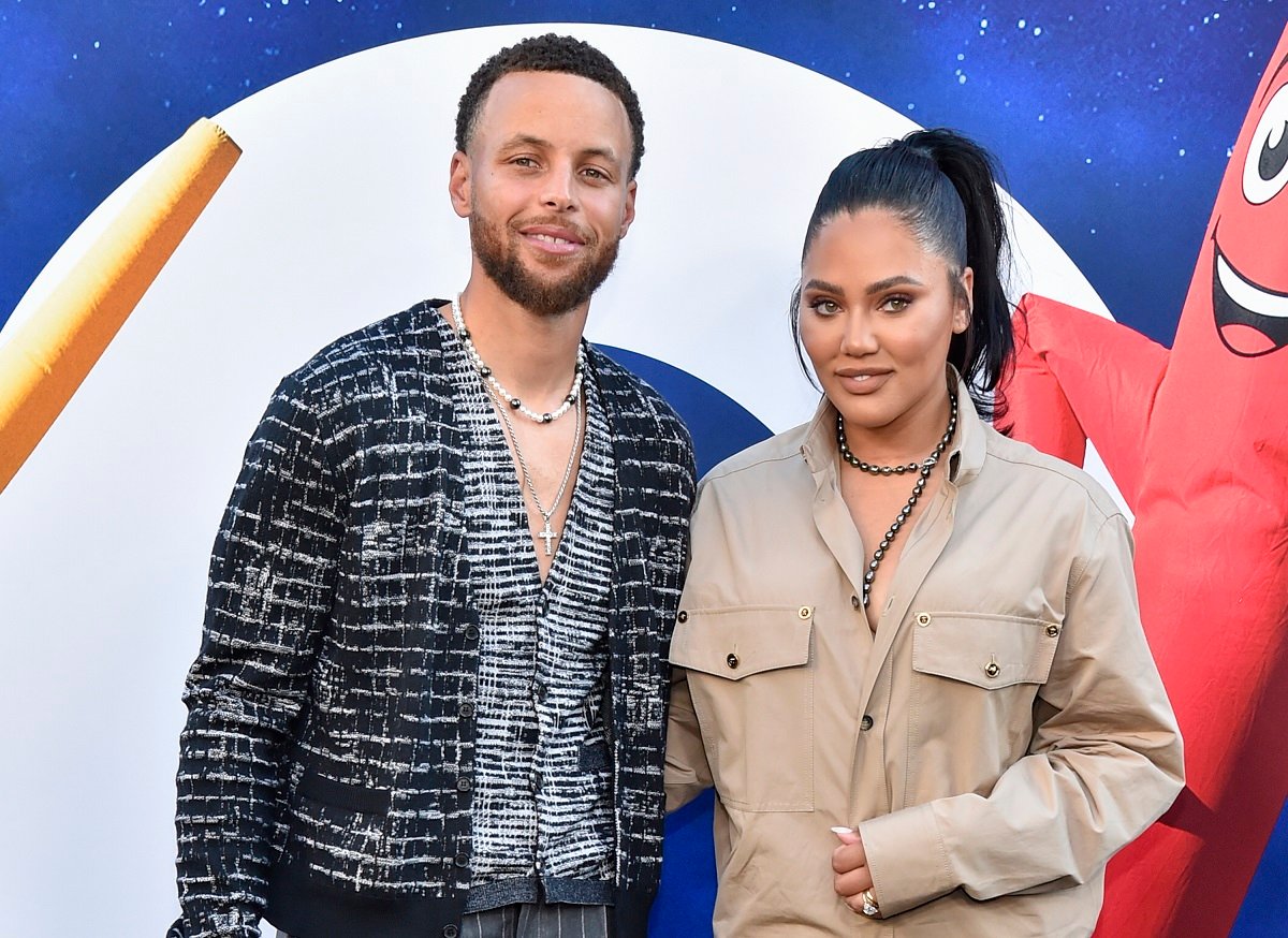Steph Curry and Ayesha Curry, who is of mixed ethnicity, smiling for photos at the world premiere of Universal Pictures' NOPE