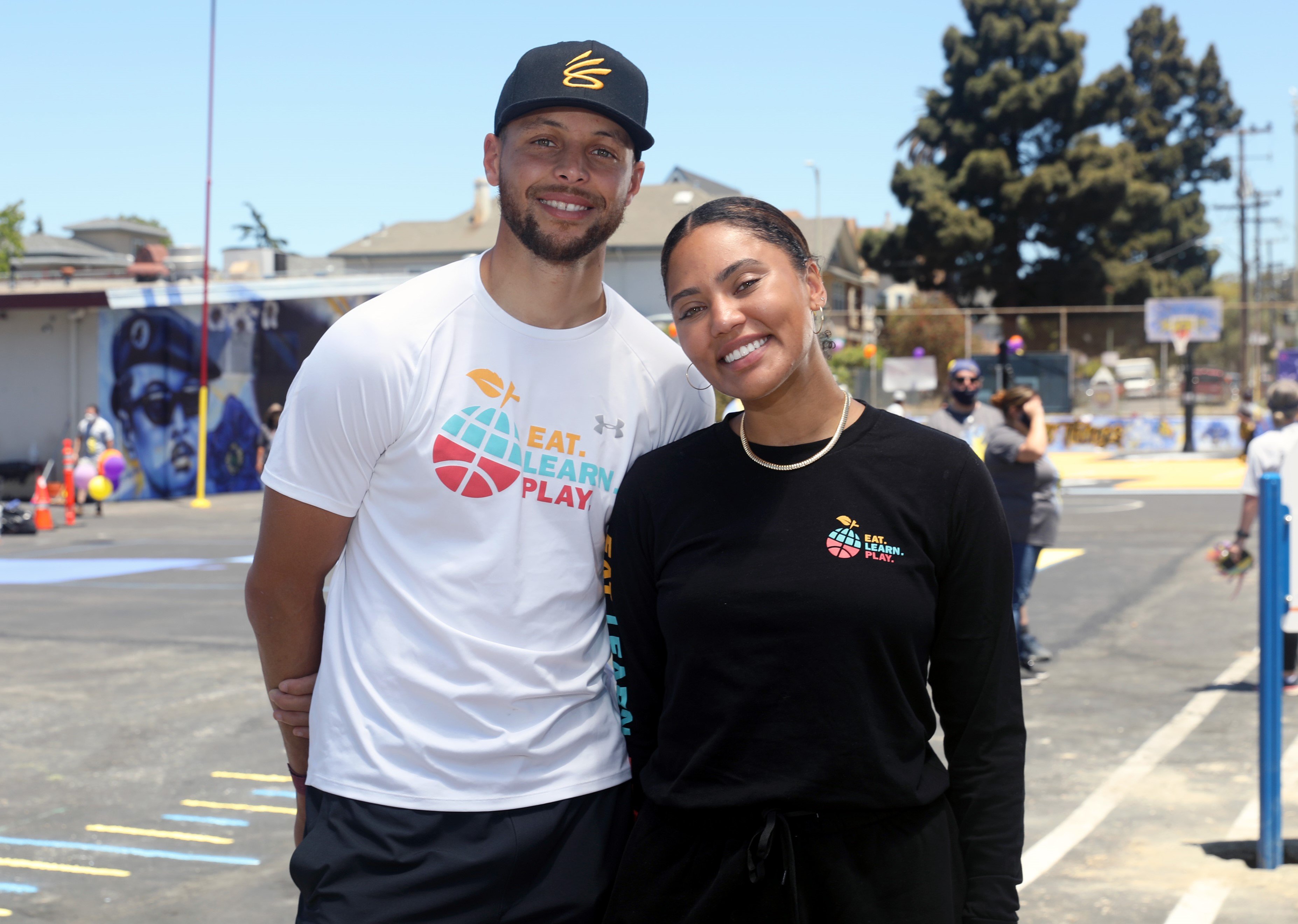 Stephen Curry and Ayesha Curry, who is of mixed ethnicity, attend Eat. Learn. Play. event in Oakland, California
